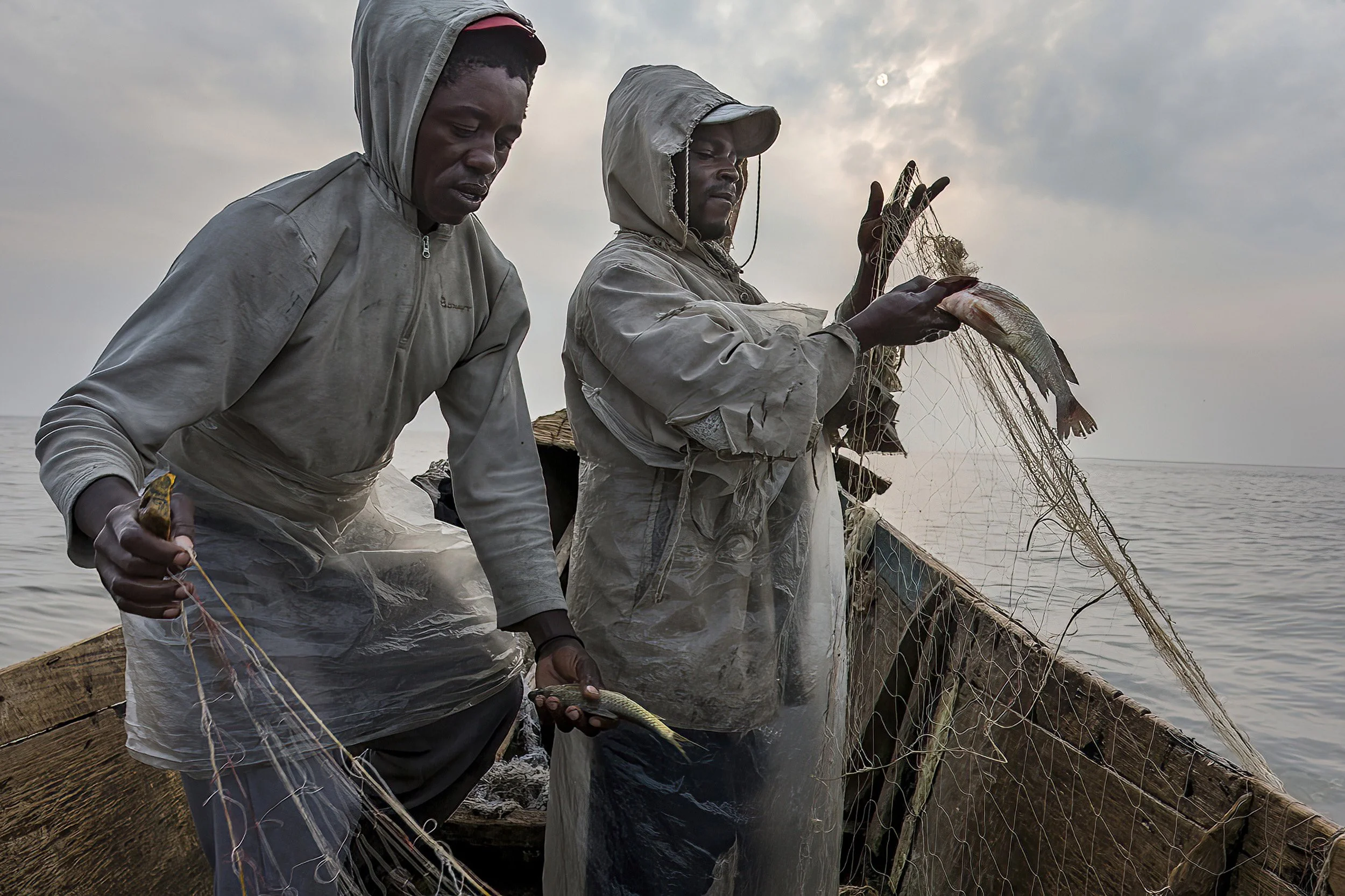 VITSHUMBI, LAKE EDWARD, DR CONGO, 28 JULY 2013: Images of fisherman at work on the Southern shores of Lake Edward, 29 July 2013. These men are amongst 30 000 other Lake Edward fisherman who utilize the lake for the livelihood of their families. The