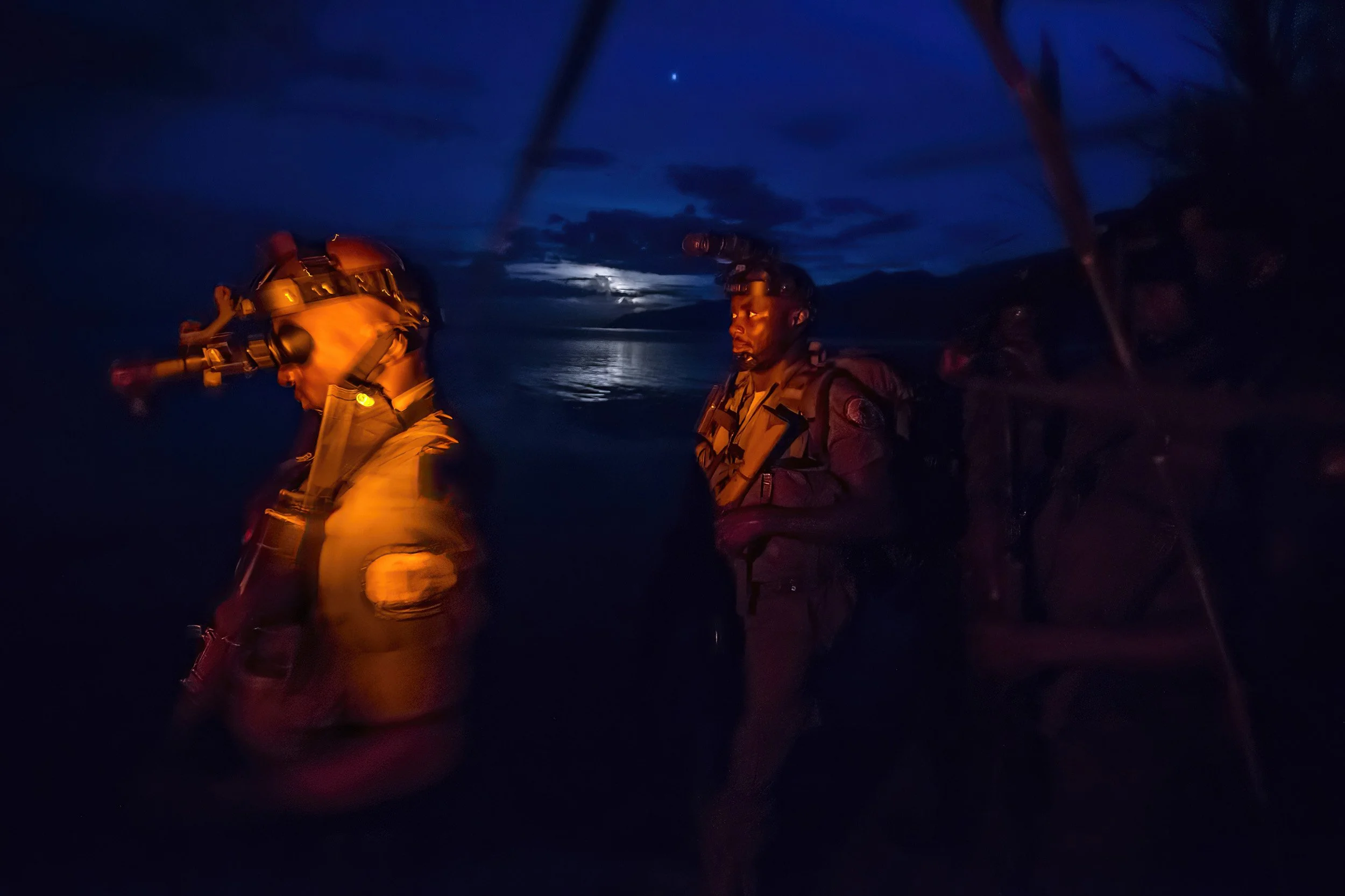 LAKE EDWARD, VIRUNGA NATIONAL PARK, DR CONGO, 11 MAY 2015: ICCN conservation Rangers move out from the Lake shore at the beginning of a night exercise against the FDLR militia group. (Photo by Brent Stirton/Reportage by Getty Images for National Geo
