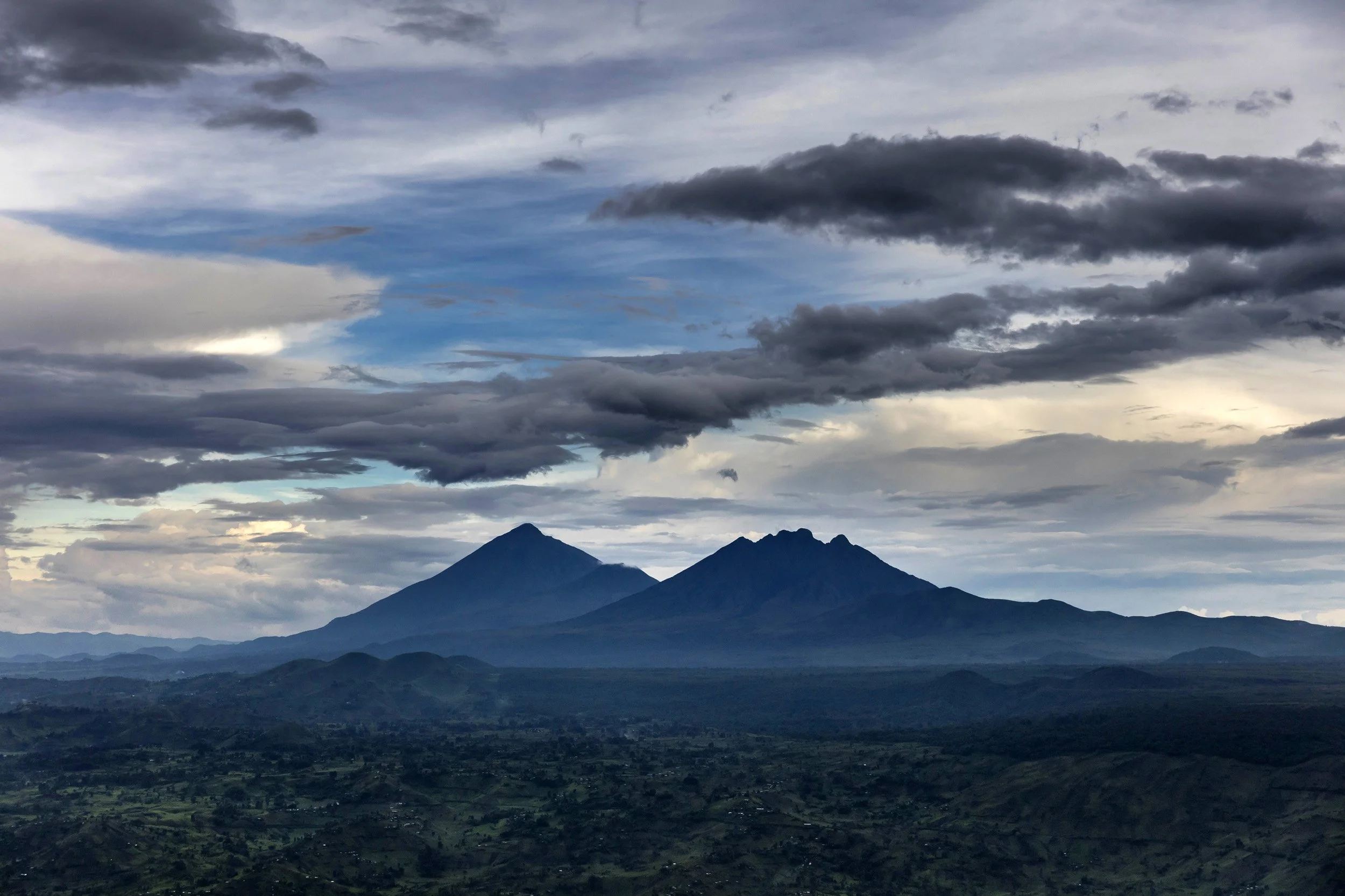 VIRUNGA NATIONAL PARK, DR CONGO, 26 NOVEMBER 2015: A view of the volcanoes Nyiragongo and Namalagira inside Virunga National Park. (Photo by Brent Stirton/Reportage for National Geographic Magazine.)