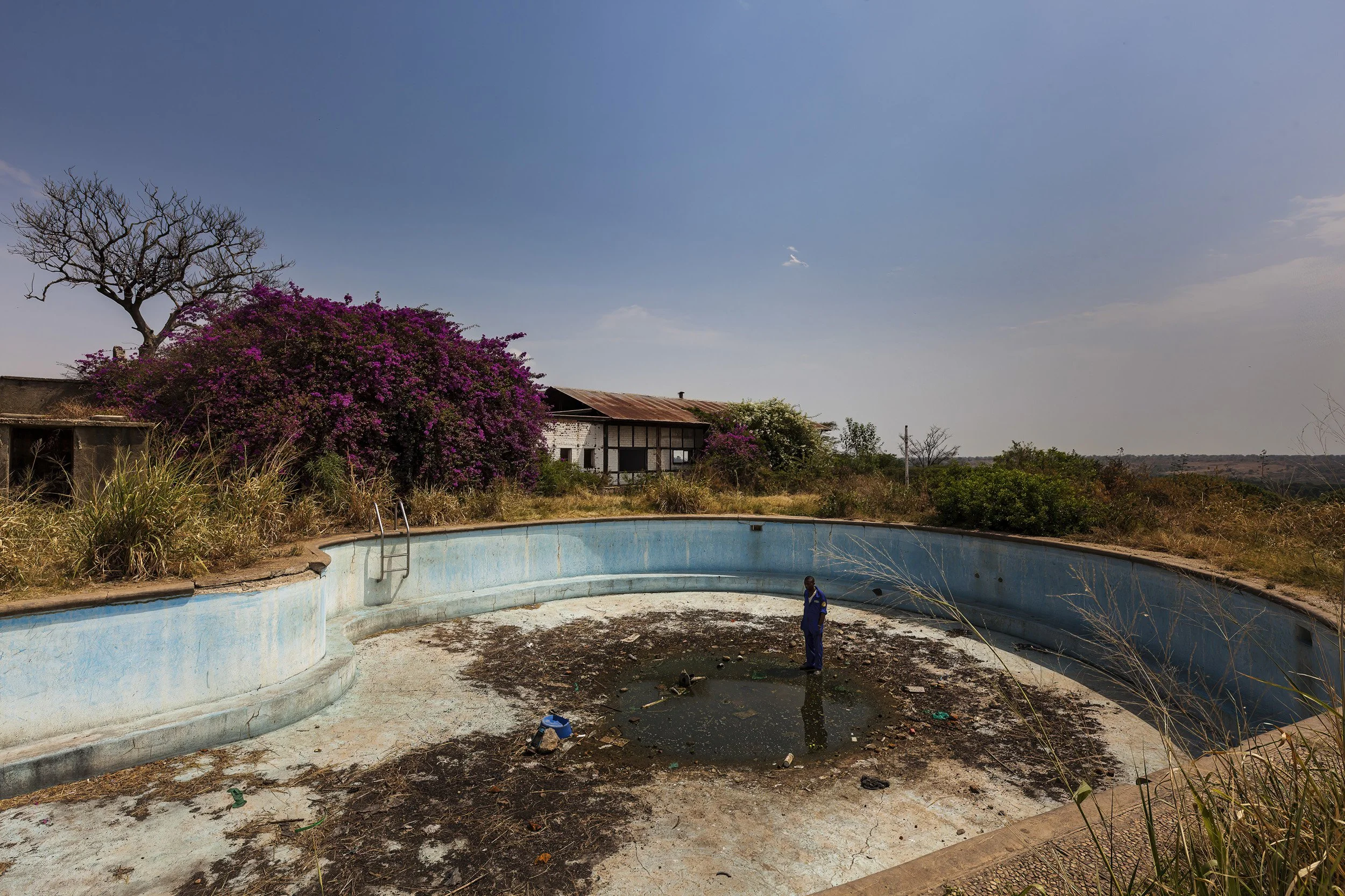 RWINDI, VIRUNGA NATIONAL PARK, DRC, MARCH 2012: The destroyed remains of the Rwindi hotel, once a popular resort in this part of Virunga National Park, now a shell tacked on the ICCN conservation Ranger camp at Rwindi, Virunga National Park, DRC, Ma
