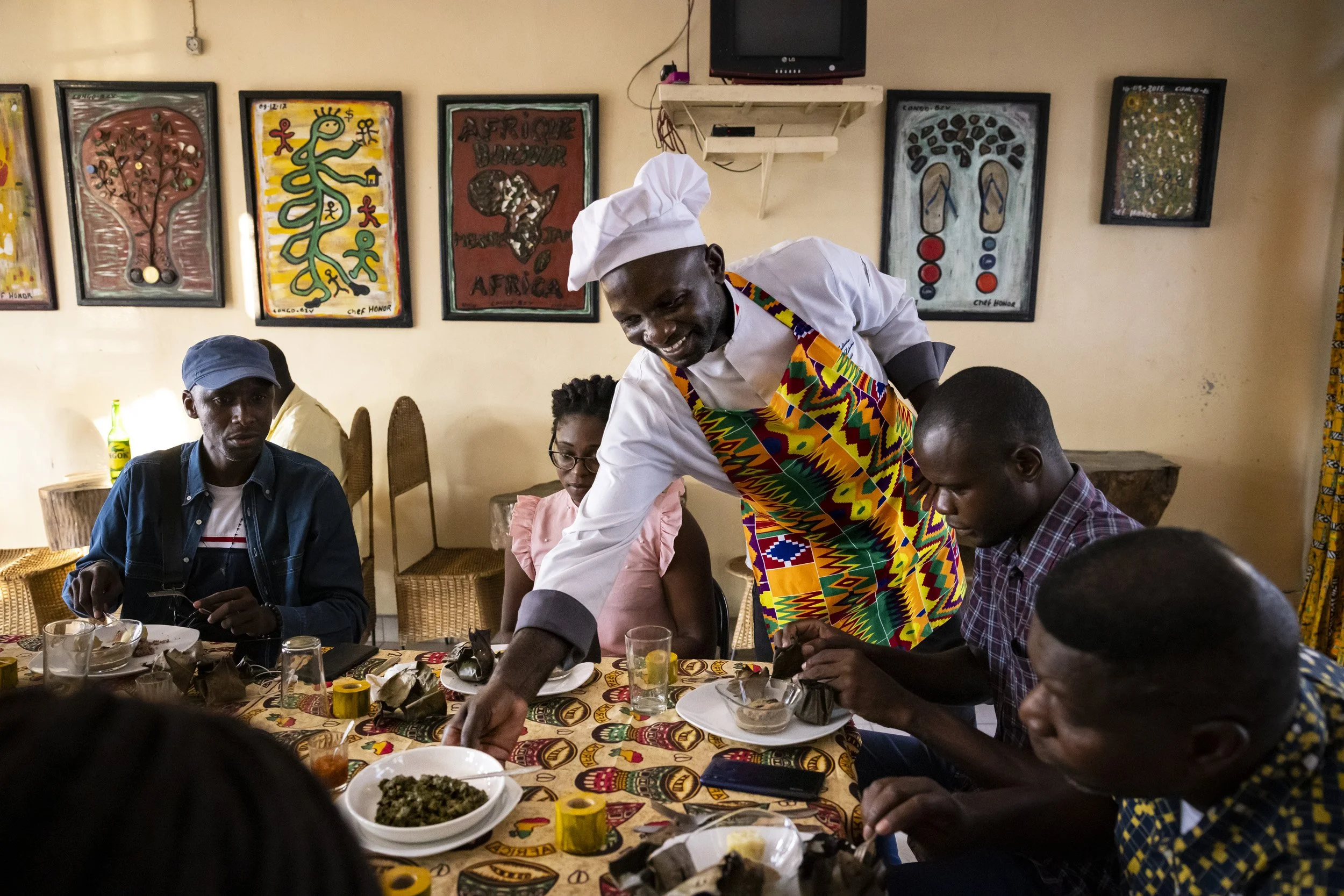 BRAZZAVILLE, REPUBLIC OF CONGO: Honor Toudissa is an influential Chef in the Brazzaville/Kinshasa region. He is seen preparing and serving dishes made from insects in his restaurant. Honor is a believer in traditional Congolese cuisine but is not a