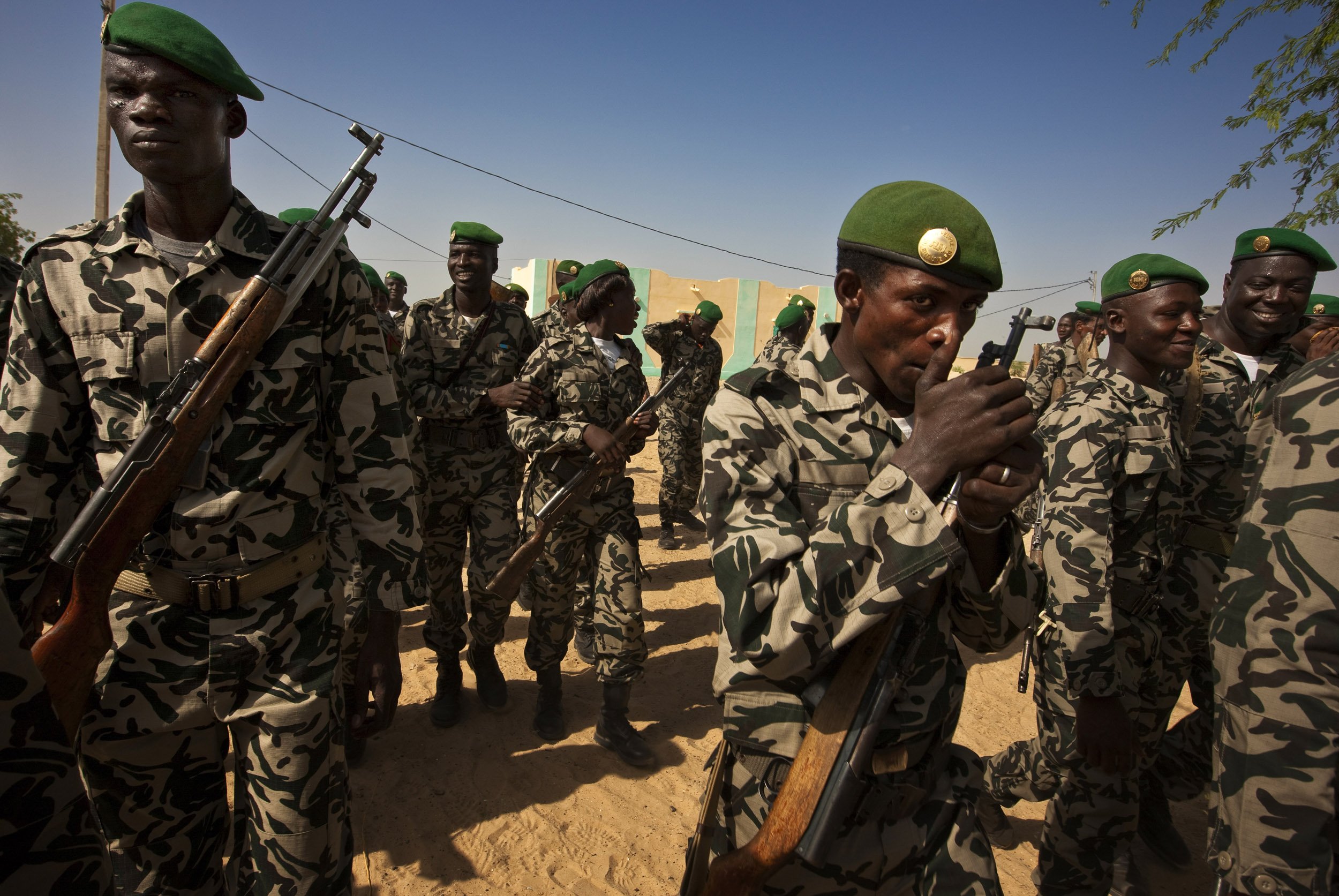 TIMBUKTU, SEPTEMBER 2009: Mali Army soldiers celebrate Mali Independence day with both formal and informal marches in the streets of Timbuktu. Fundamentalist Islamic fighters operating in the North of Mali have become an increasing security problem