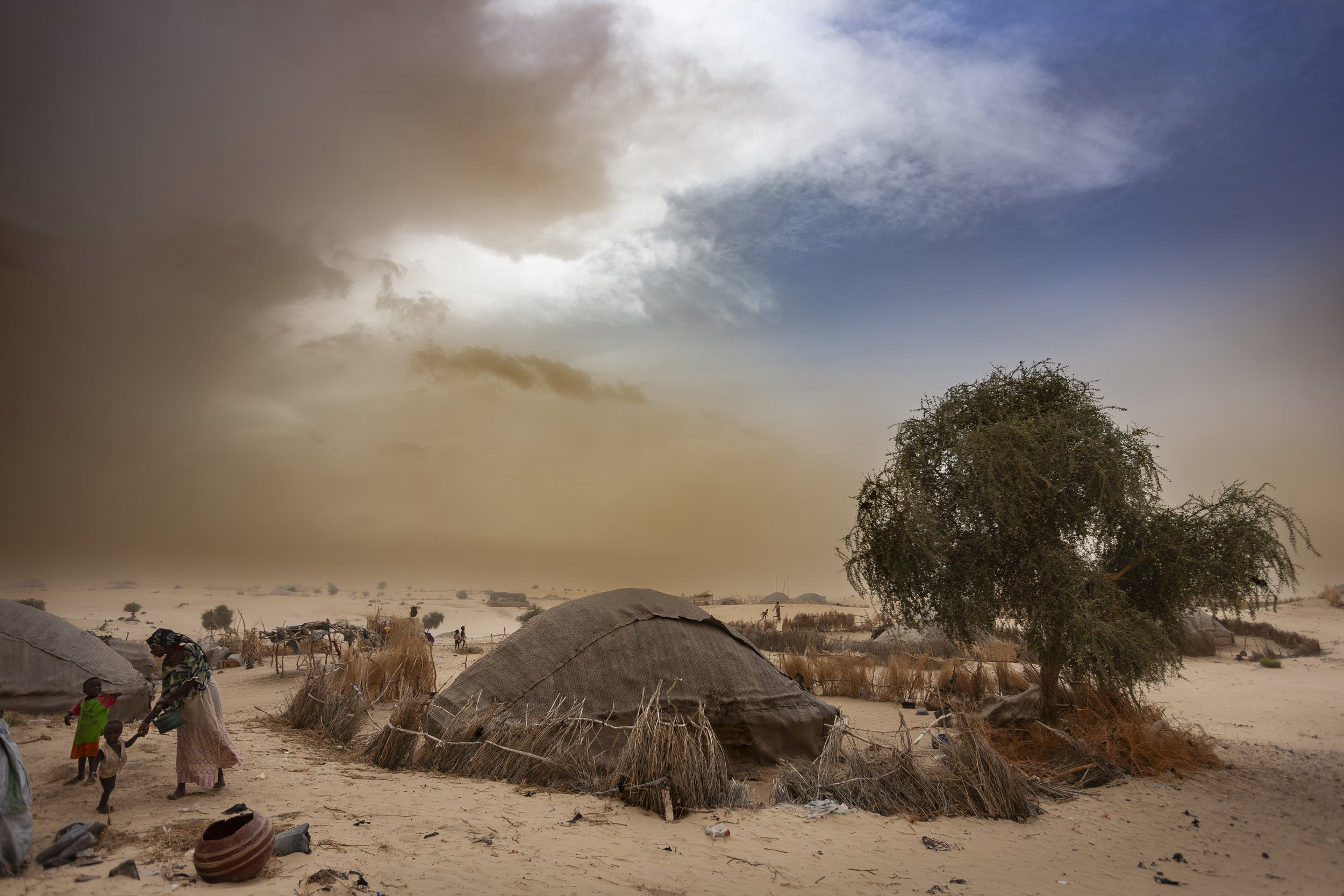 TIMBUKTU, SEPTEMBER 2009: Images of temporary camps and houses on the outskirts of Timbuktu in the middle of a sandstorm, Mali, September 15, 2009. Timbuktu is a historical Malian city, a long established centre of learning for Africa. It has tradit