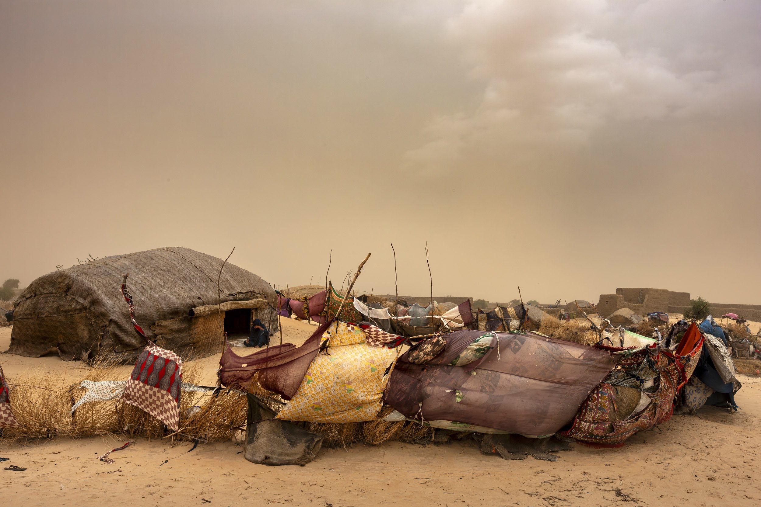 TIMBUKTU, SEPTEMBER 2009: Images of temporary camps and houses on the outskirts of Timbuktu in the middle of a sandstorm, Mali, September 15, 2009. Timbuktu is a historical Malian city, a long established centre of learning for Africa. It has tradit