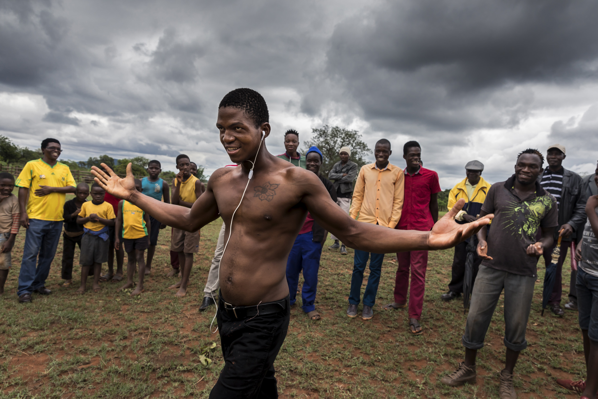 TSHIFIDI, VENDA, SOUTH AFRICA, 15 DECEMBER 2016: Men and boys of the Venda tribe challenge each other and fight bare knuckle over the festive period in South Africa. This is a tradition that dates back 200 years and began when herd boys tried to get
