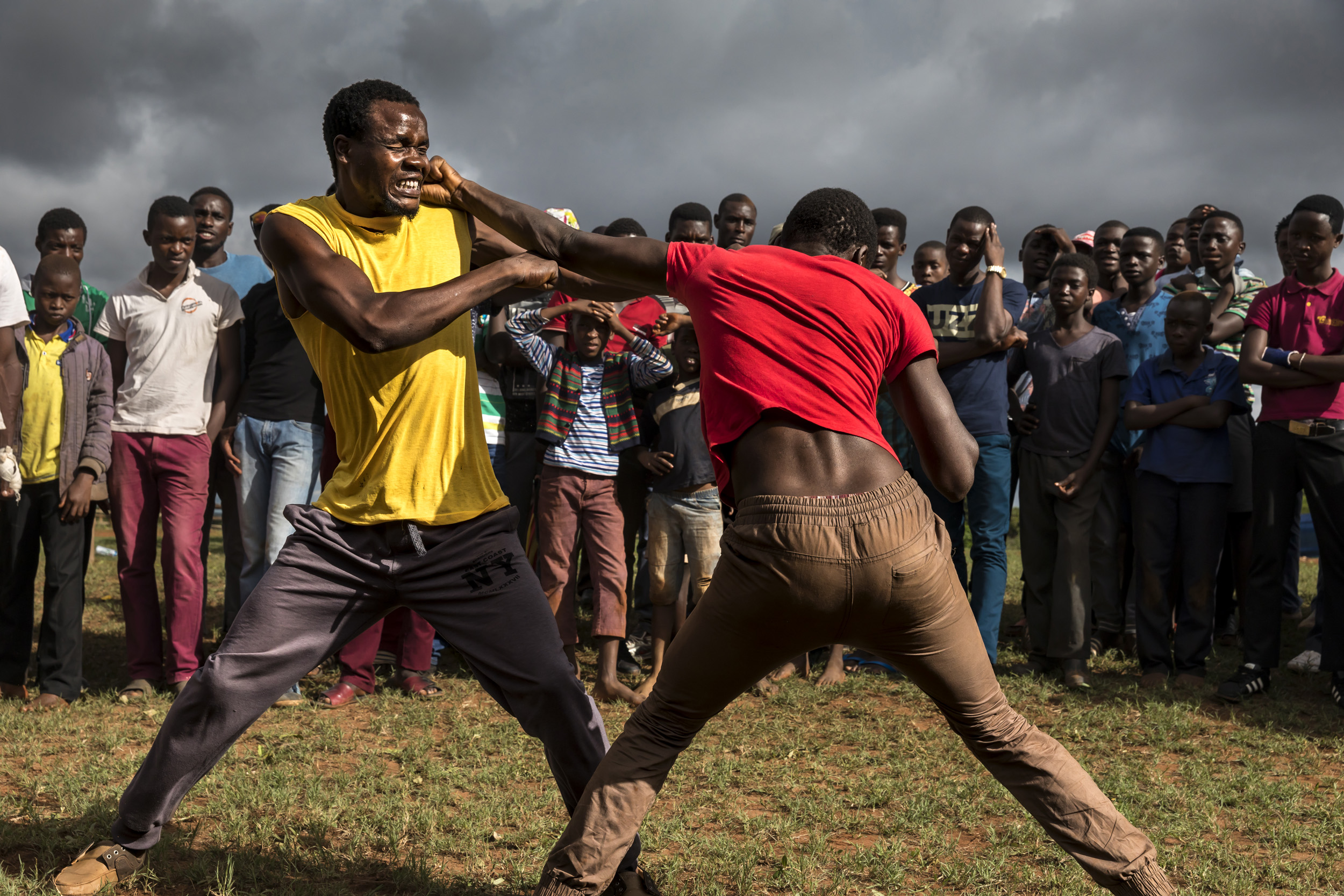TSHIFIDI, VENDA, SOUTH AFRICA, 15 DECEMBER 2016: Men and boys of the Venda tribe challenge each other and fight bare knuckle over the festive period in South Africa. This is a tradition that dates back 200 years and began when herd boys tried to get