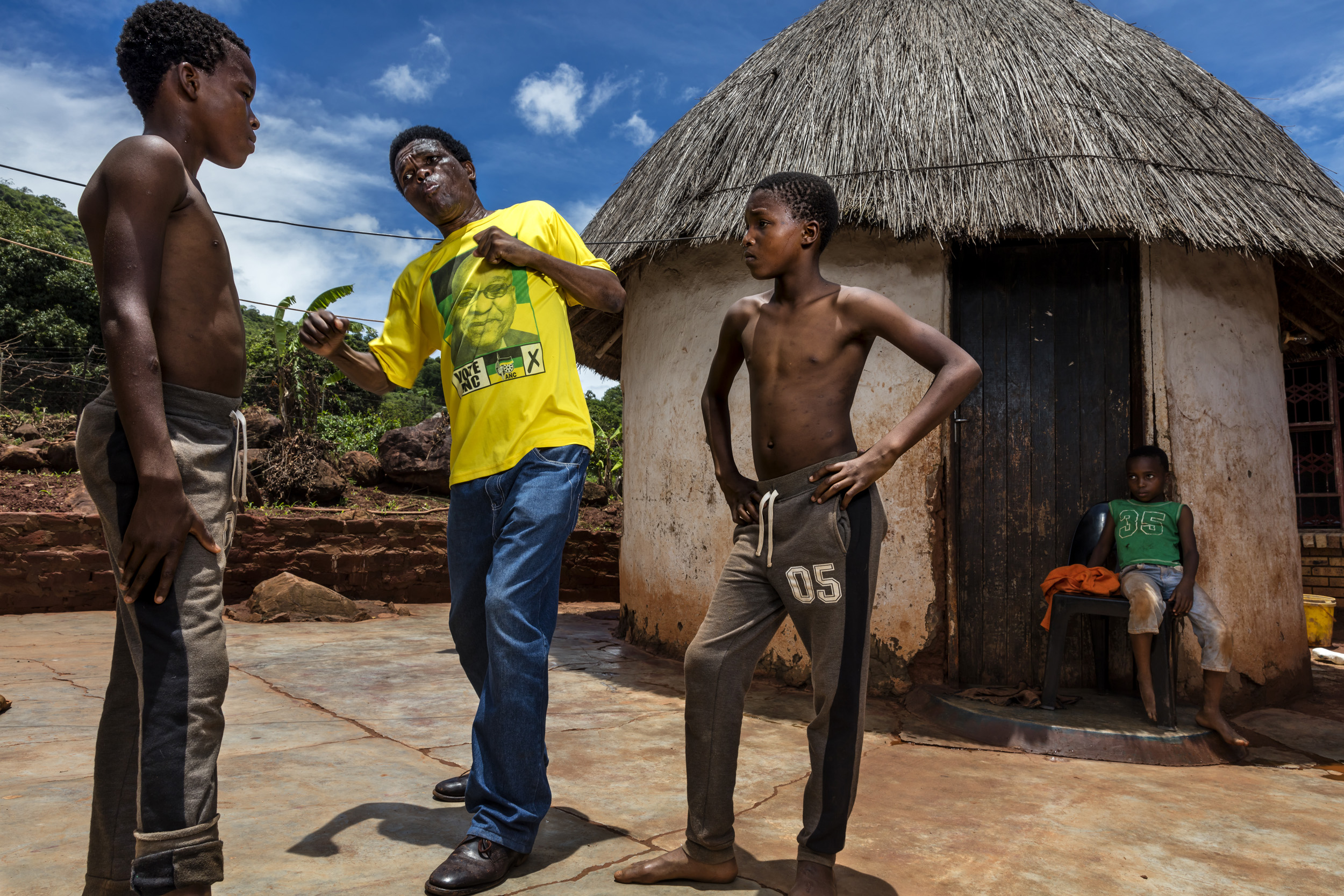 VENDA, SOUTH AFRICA, 11 DECEMBER 2016: "Poison" Ndevana, 58, is the president of the Musangwe Comittee in Venda, he is seen training his two eldest boys Mudshidzi, 15, and Nanjana, 13. Poison says his two eldest are still too young to train seriousl