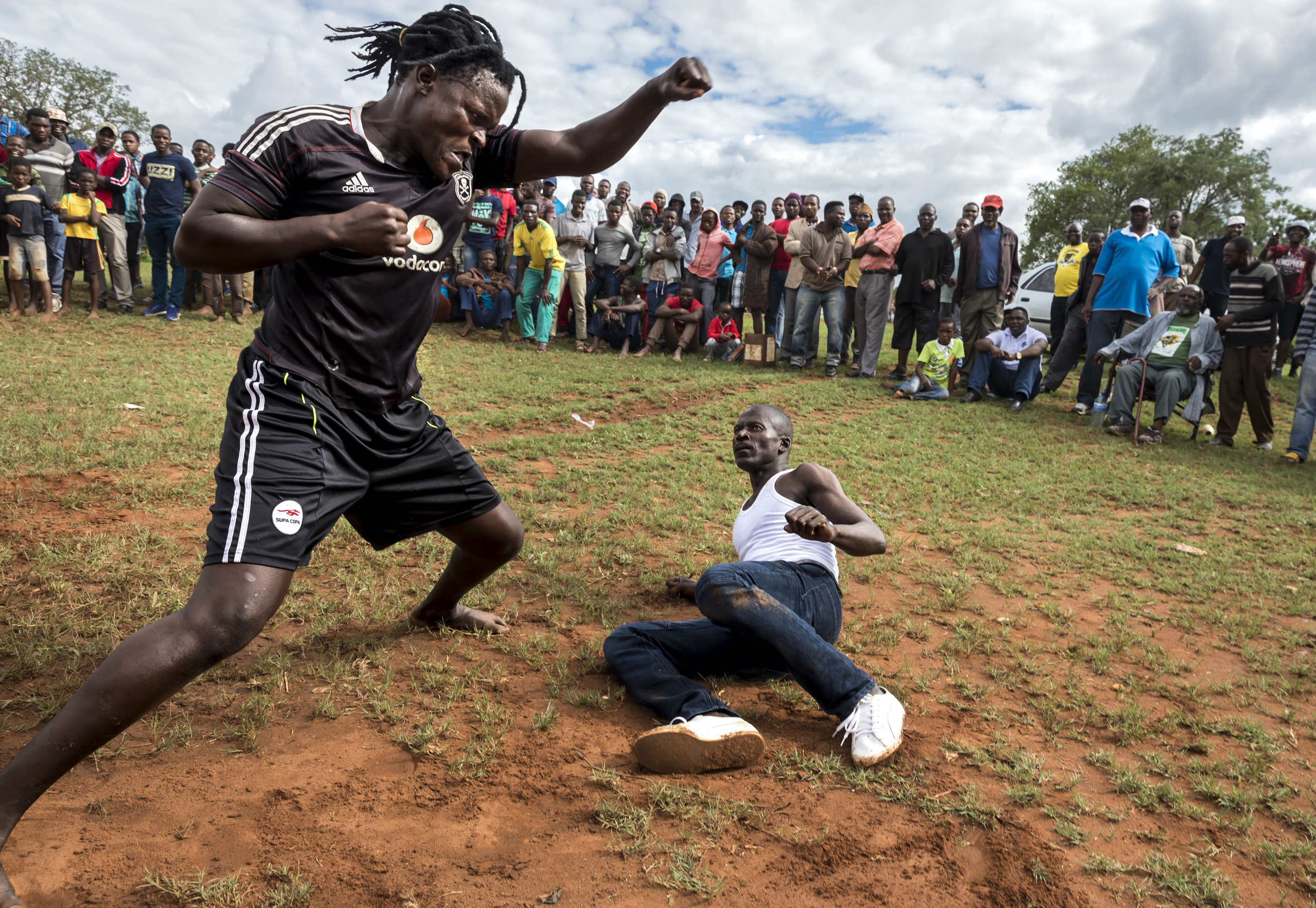 TSHIFIDI, VENDA, SOUTH AFRICA, 15 DECEMBER 2016: Men and boys of the Venda tribe challenge each other and fight bare knuckle over the festive period in South Africa. This is a tradition that dates back 200 years and began when herd boys tried to get