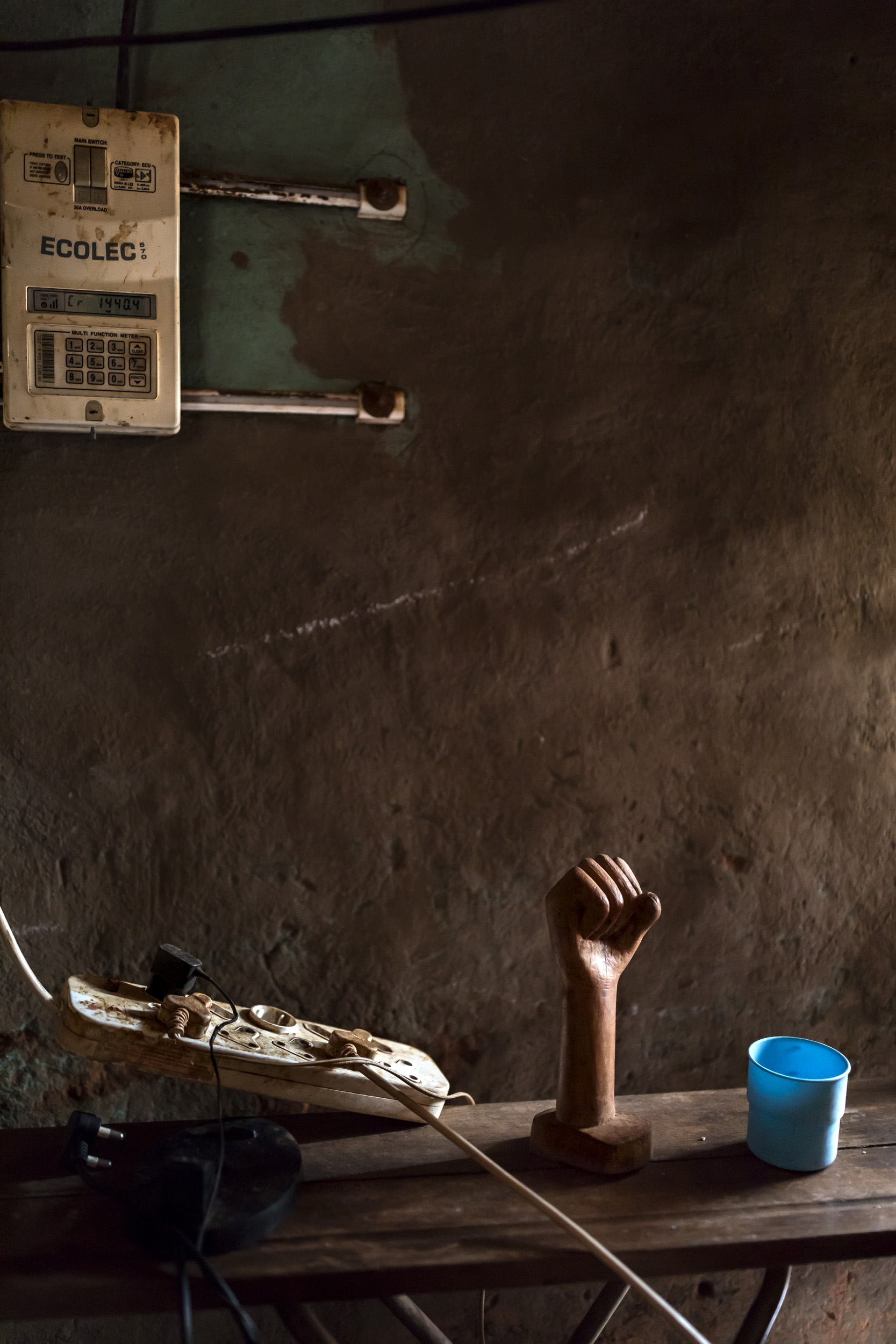 VENDA, SOUTH AFRICA, 11 DECEMBER 2016: A Musangwe bare knuckle boxing trophy carved from wood sits on an ironing board inside the home of "Poison" Ndevana, 58. Poison is the president of the Musangwe Comittee in Venda. Musangwe is traditional bare k