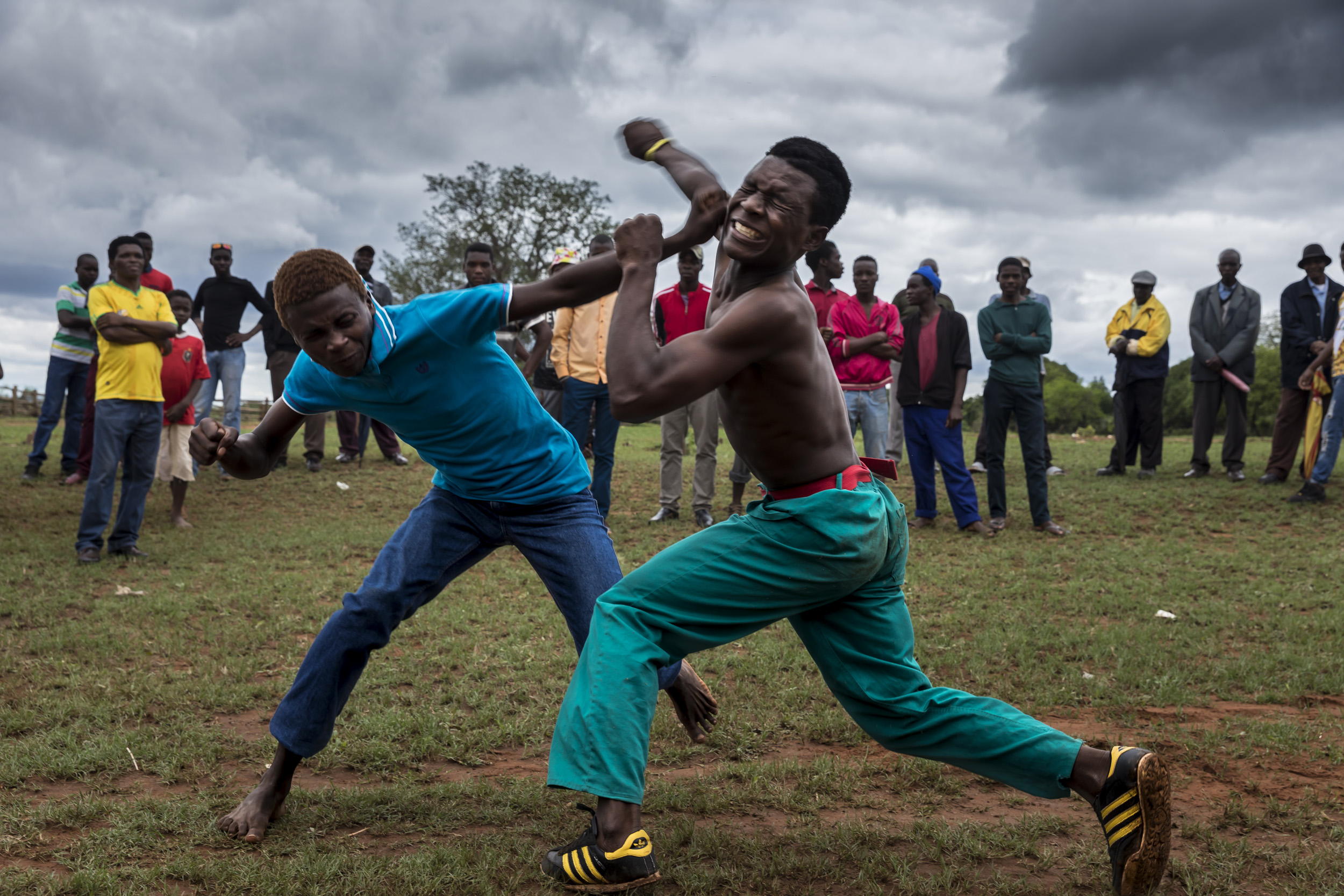 TSHIFIDI, VENDA, SOUTH AFRICA, 15 DECEMBER 2016: Men and boys of the Venda tribe challenge each other and fight bare knuckle over the festive period in South Africa. This is a tradition that dates back 200 years and began when herd boys tried to get