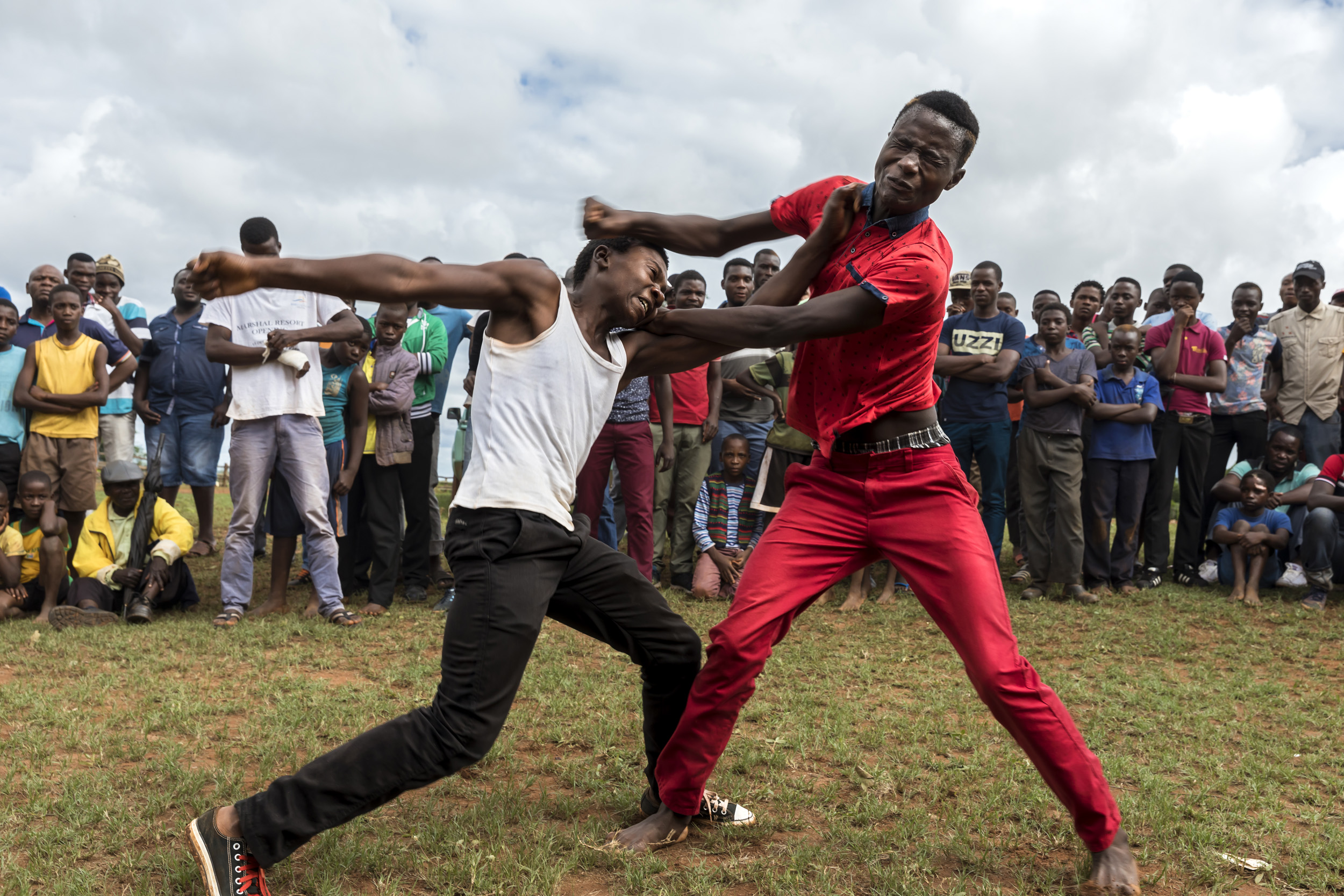 TSHIFIDI, VENDA, SOUTH AFRICA, 15 DECEMBER 2016: Men and boys of the Venda tribe challenge each other and fight bare knuckle over the festive period in South Africa. This is a tradition that dates back 200 years and began when herd boys tried to get