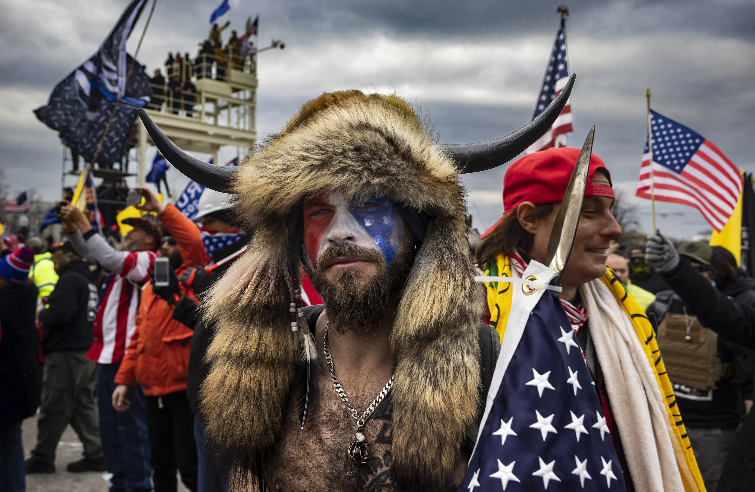 WASHINGTON D.C., USA - JANUARY 6: Jacob Anthony Angeli Chansley, known as the QAnon Shaman, is seen at the Capital riots. On January 9, Chansley was arrested on federal charges of "knowingly entering or remaining in any restricted building or ground