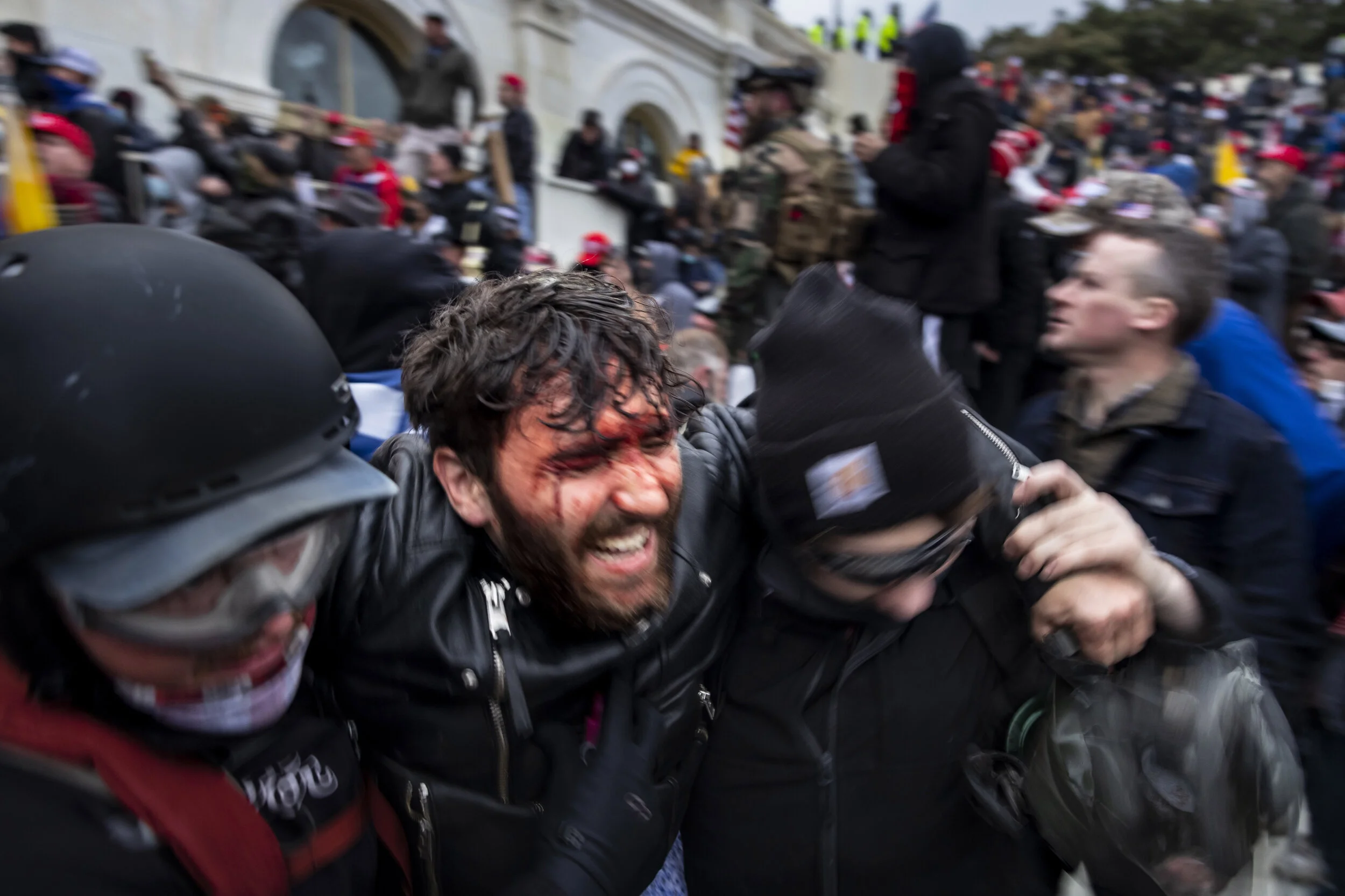 WASHINGTON D.C., USA - JANUARY 6: Trump supporters clash with police and security forces as people try to storm the US Capitol in Washington D.C on January 6, 2021. - Demonstrators breeched security and entered the Capitol as Congress debated the 20