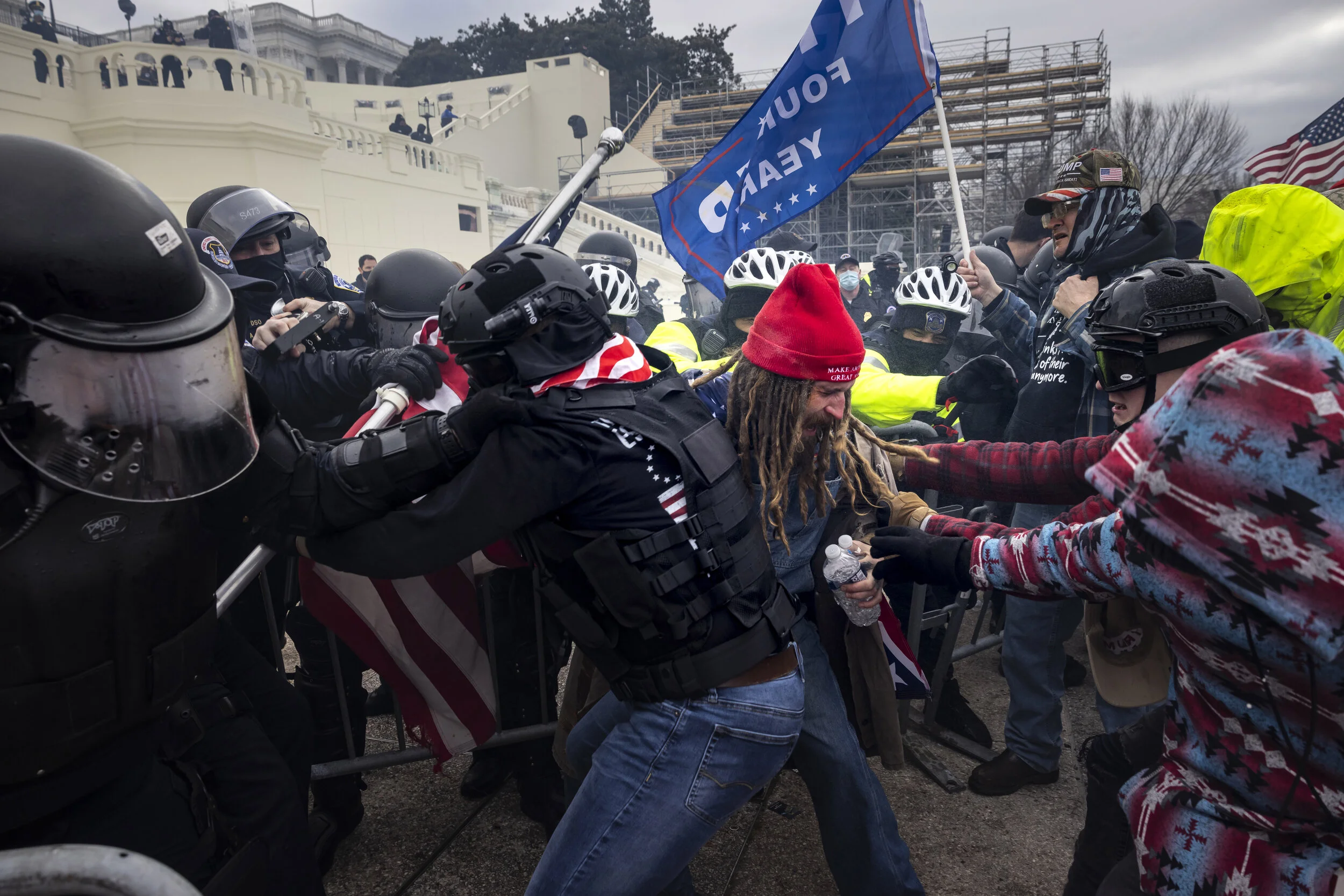 WASHINGTON D.C., USA - JANUARY 6: Trump supporters clash with police and security forces as people try to storm the US Capitol in Washington D.C on January 6, 2021. Demonstrators breeched security and entered the Capitol as Congress debated the 2020