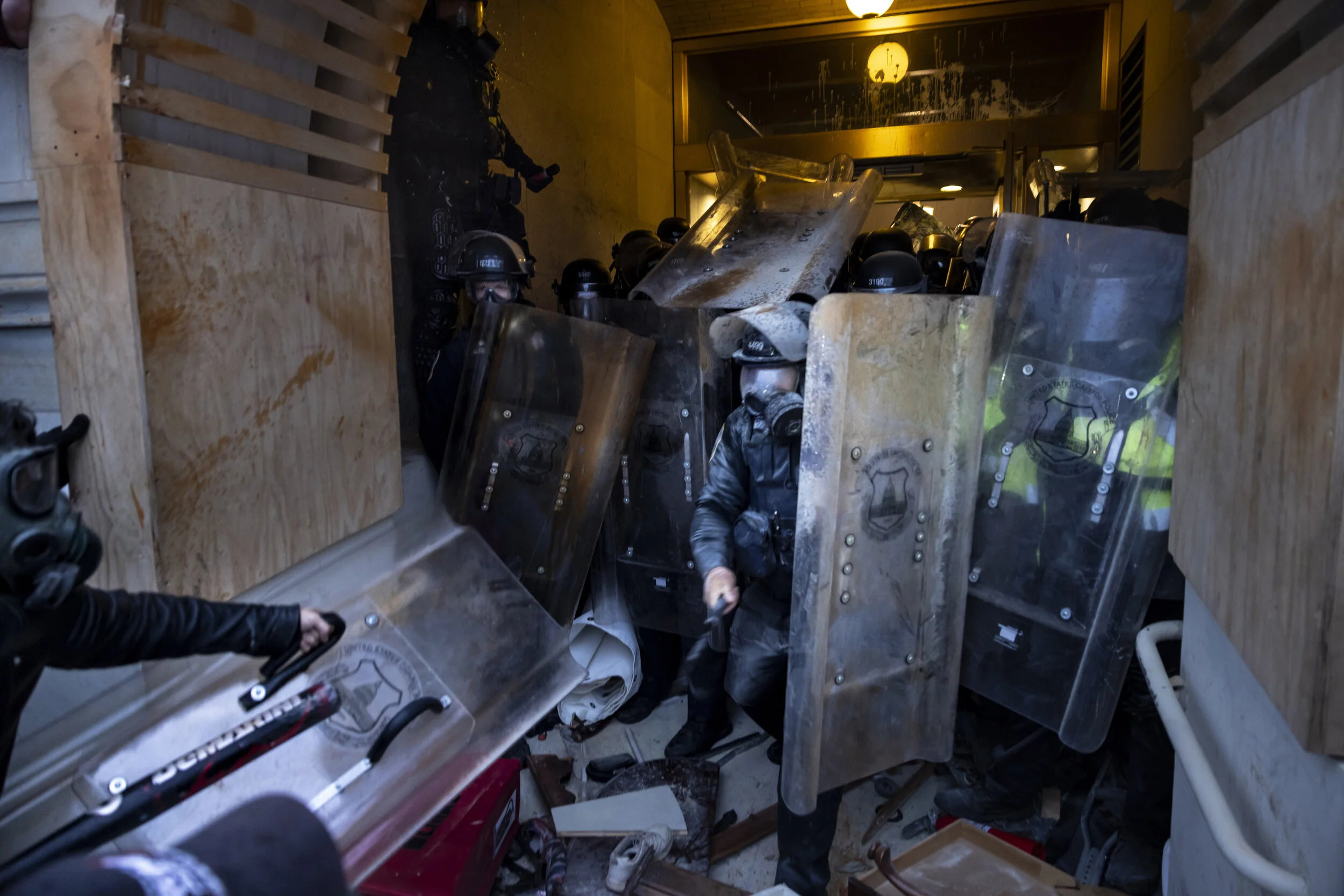 WASHINGTON D.C., USA - JANUARY 6: Trump supporters clash with police and security forces as people try to storm the US Capitol in Washington D.C on January 6, 2021. - Demonstrators breeched security and entered the Capitol as Congress debated the 20