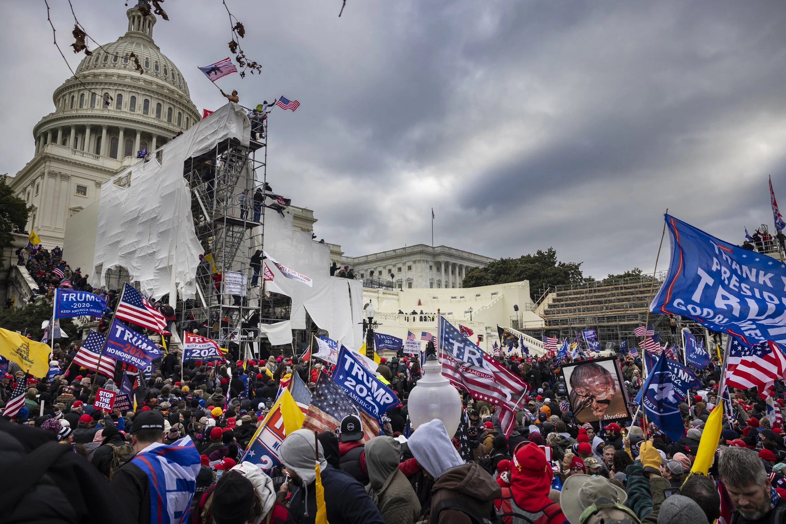 WASHINGTON D.C., USA - JANUARY 6: Trump supporters clash with police and security forces as people try to storm the US Capitol in Washington D.C on January 6, 2021. Demonstrators breeched security and entered the Capitol as Congress debated the 2020