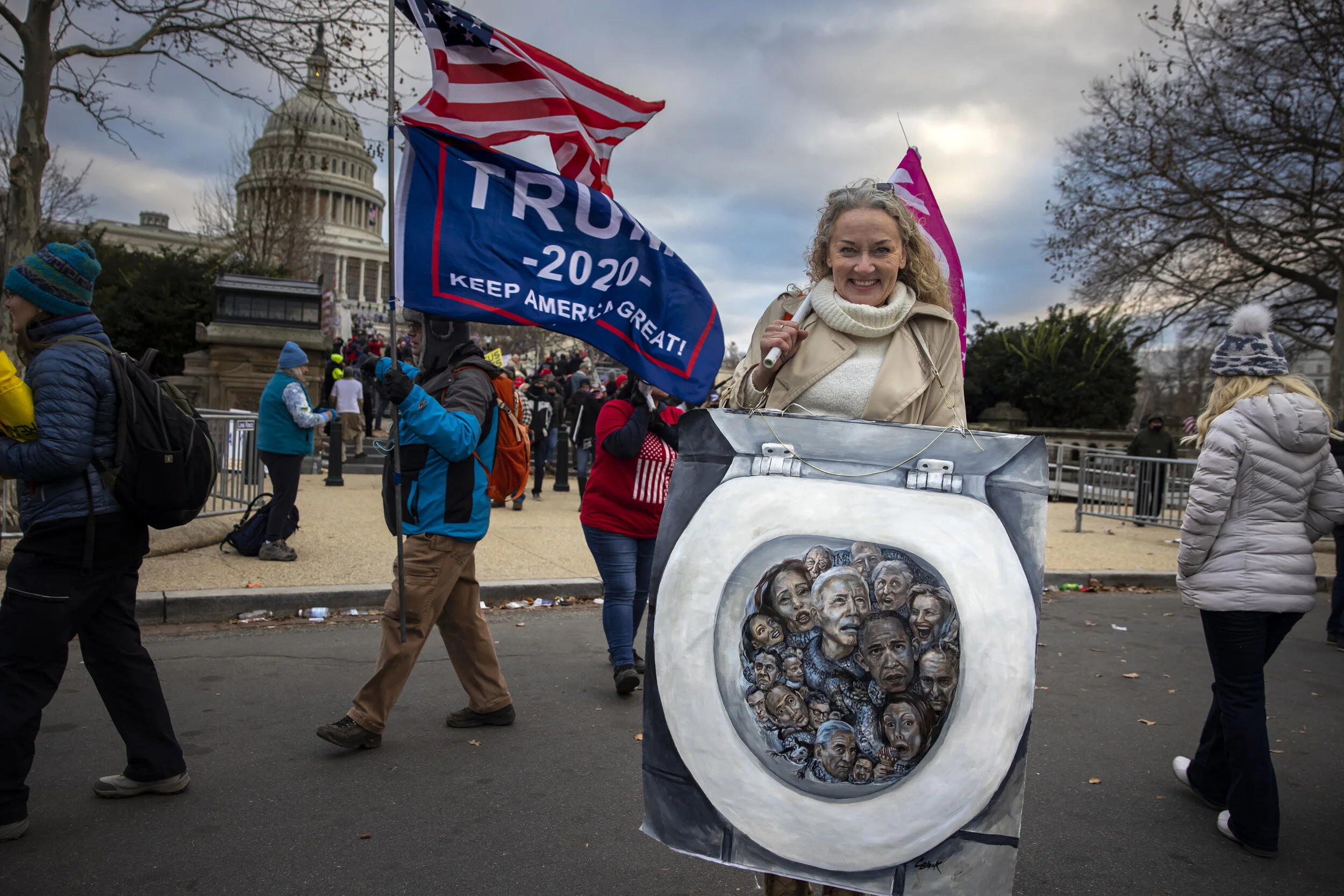 nation's capital to protest the ratification of President-elect Joe Biden's Electoral College victory over President Trump in the 2020 election. A pro-Trump mob later stormed the Capitol, breaking windows and clashing with police officers. Five peop