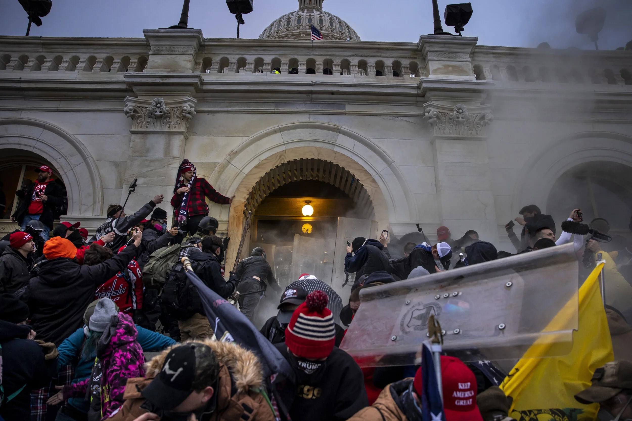 WASHINGTON D.C., USA - JANUARY 6: Trump supporters clash with police and security forces as people try to storm the US Capitol in Washington D.C on January 6, 2021. - Demonstrators breeched security and entered the Capitol as Congress debated the 20