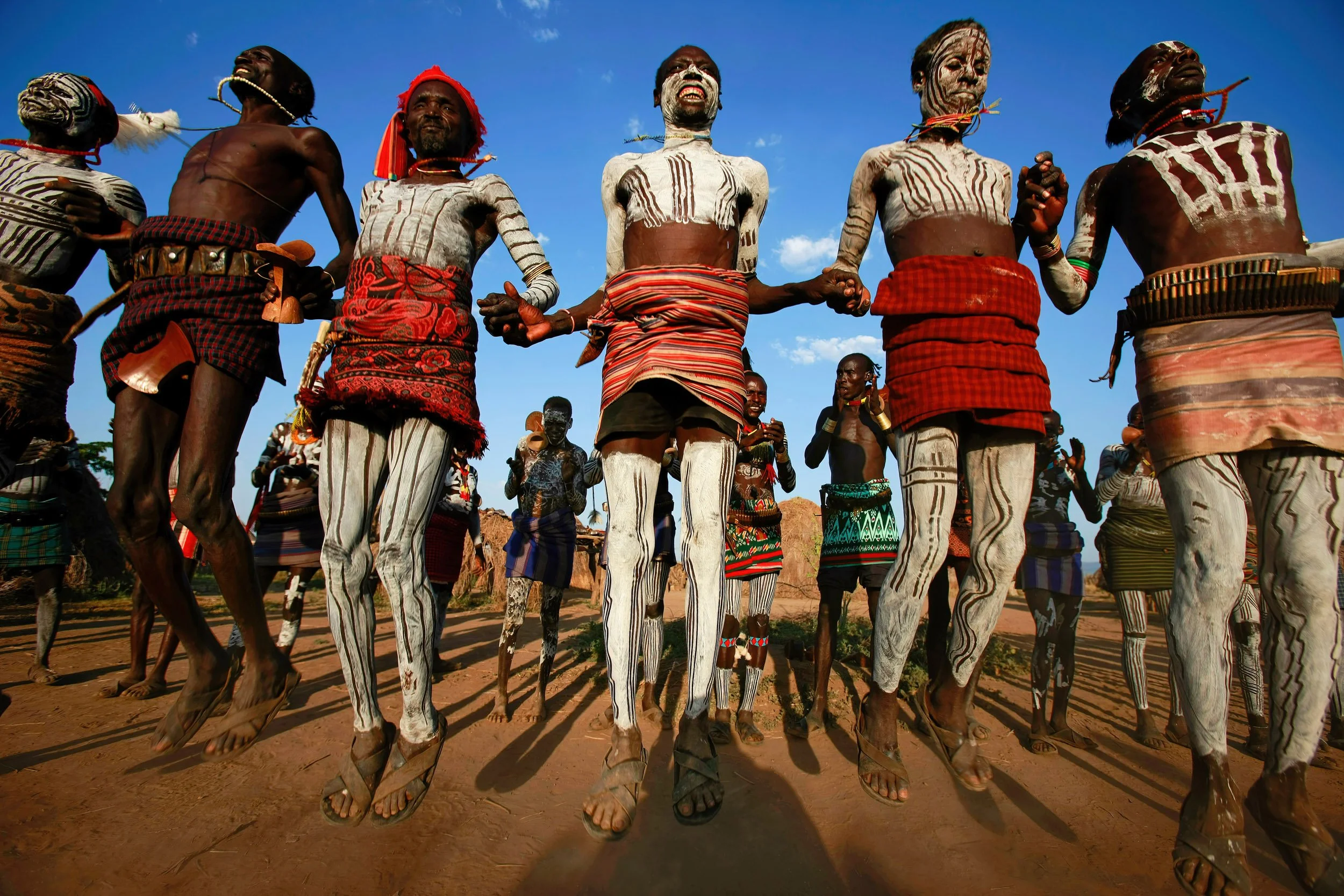 DUS, OMO VALLEY, ETHIOPIA, DECEMBER 2007: Images of the Karo people in a traditional dance ceremony with both men and women in the Omo Valley, South West Ethiopia, 14 December 2007. (Photo by Brent Stirton/Getty Images.)