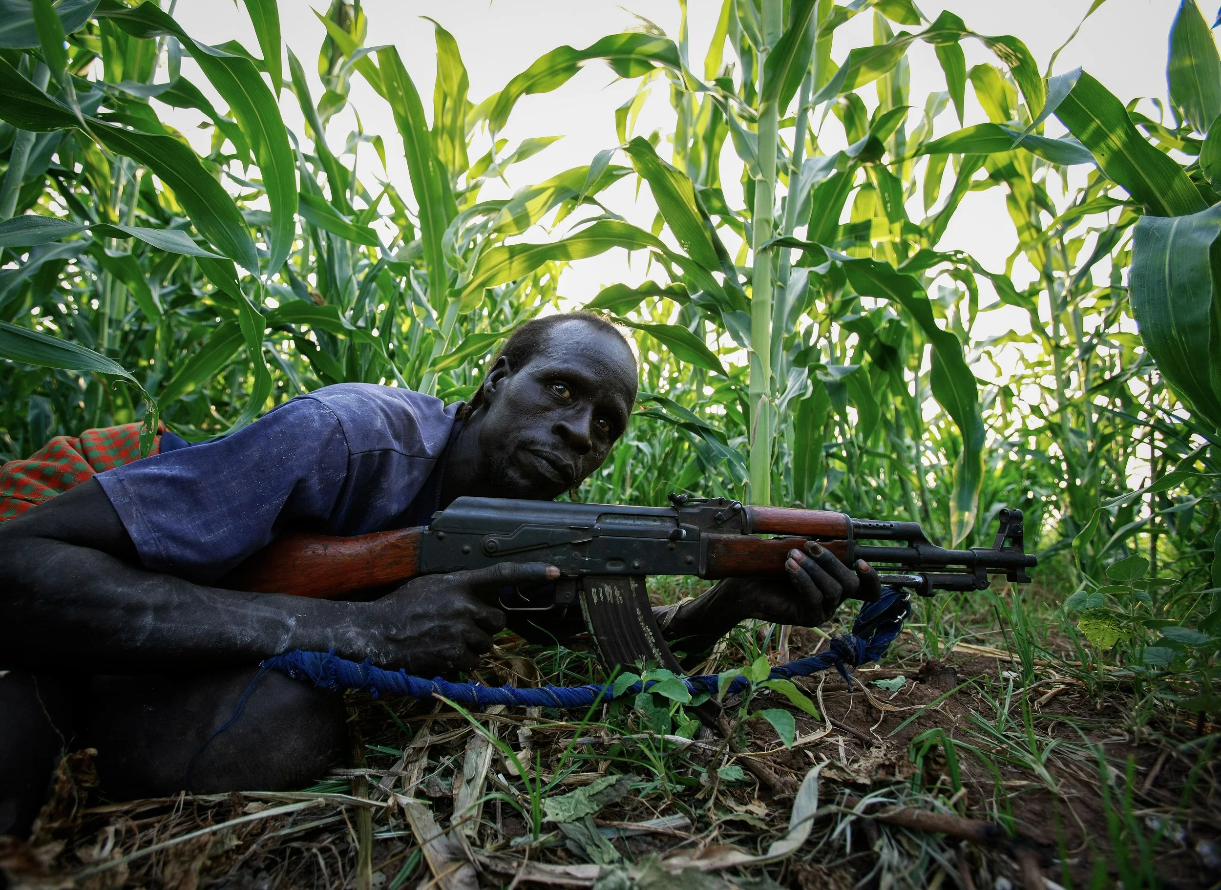 DUS, OMO VALLEY, ETHIOPIA, DECEMBER 2007: Images of Karo tribesman clashing with Bume people who have fired on them over a land dispute in the Omo Valley, South West Ethiopia, 14 December 2007. (Photo by Brent Stirton/Getty Images.)