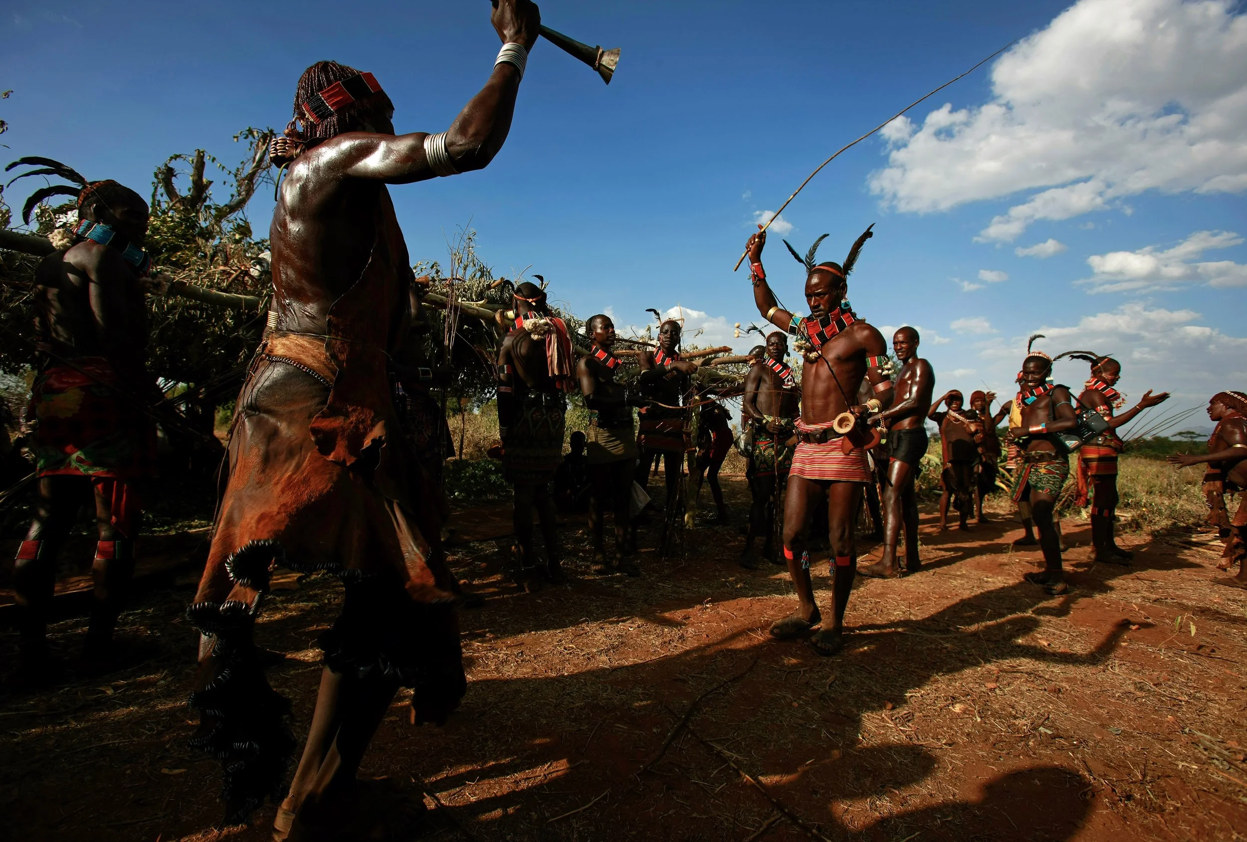 DILABYNO, OMO VALLEY, ETHIOPIA, DECEMBER 2007: Images of the Beshadar people, closely related to the Hamar tribe, in a traditional bull-jumping ceremony in the Omo Valley, South West Ethiopia, 14 December 2007. The bull-jumping ceremony is one of th