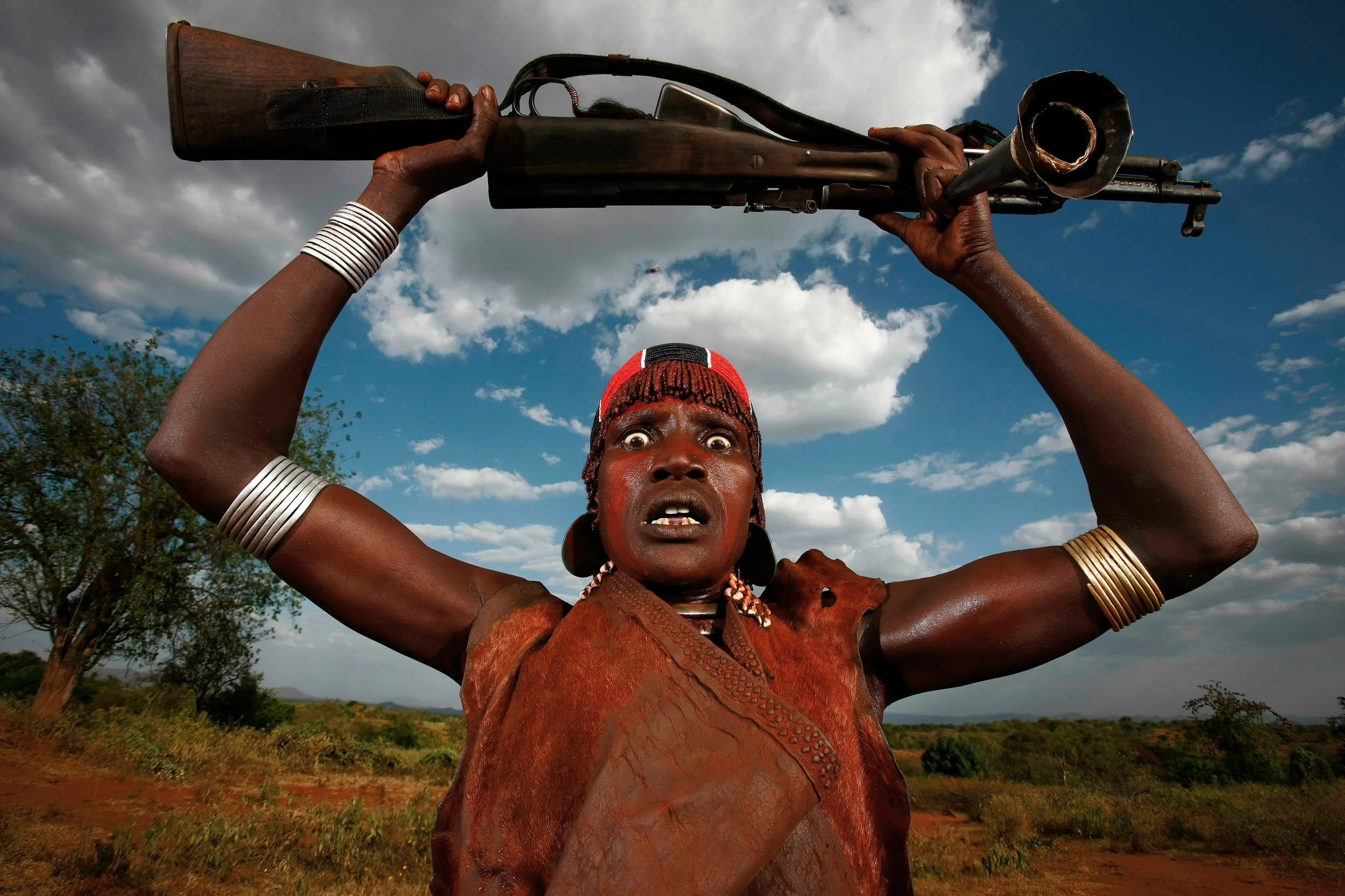 DILABYNO, OMO VALLEY, ETHIOPIA, DECEMBER 2007: Images of the Beshadar people, closely related to the Hamar tribe, in a traditional bull-jumping ceremony in the Omo Valley, South West Ethiopia, 14 December 2007. The bull-jumping ceremony is one of th