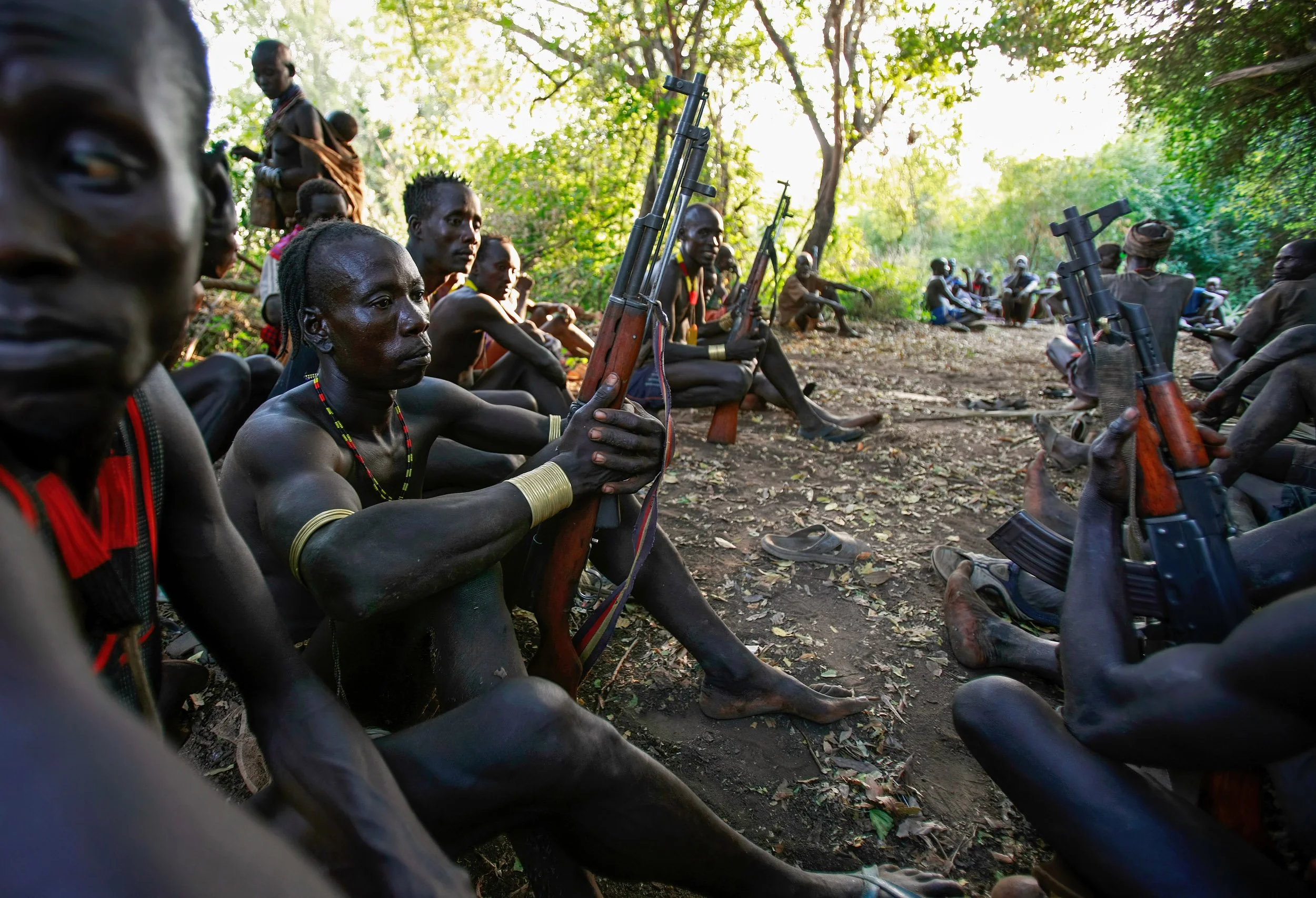 DUS, OMO VALLEY, ETHIOPIA, DECEMBER 2007: Images of Karo tribesman clashing with Bume people who have fired on them over a land dispute in the Omo Valley, South West Ethiopia, 14 December 2007. (Photo by Brent Stirton/Getty Images.)