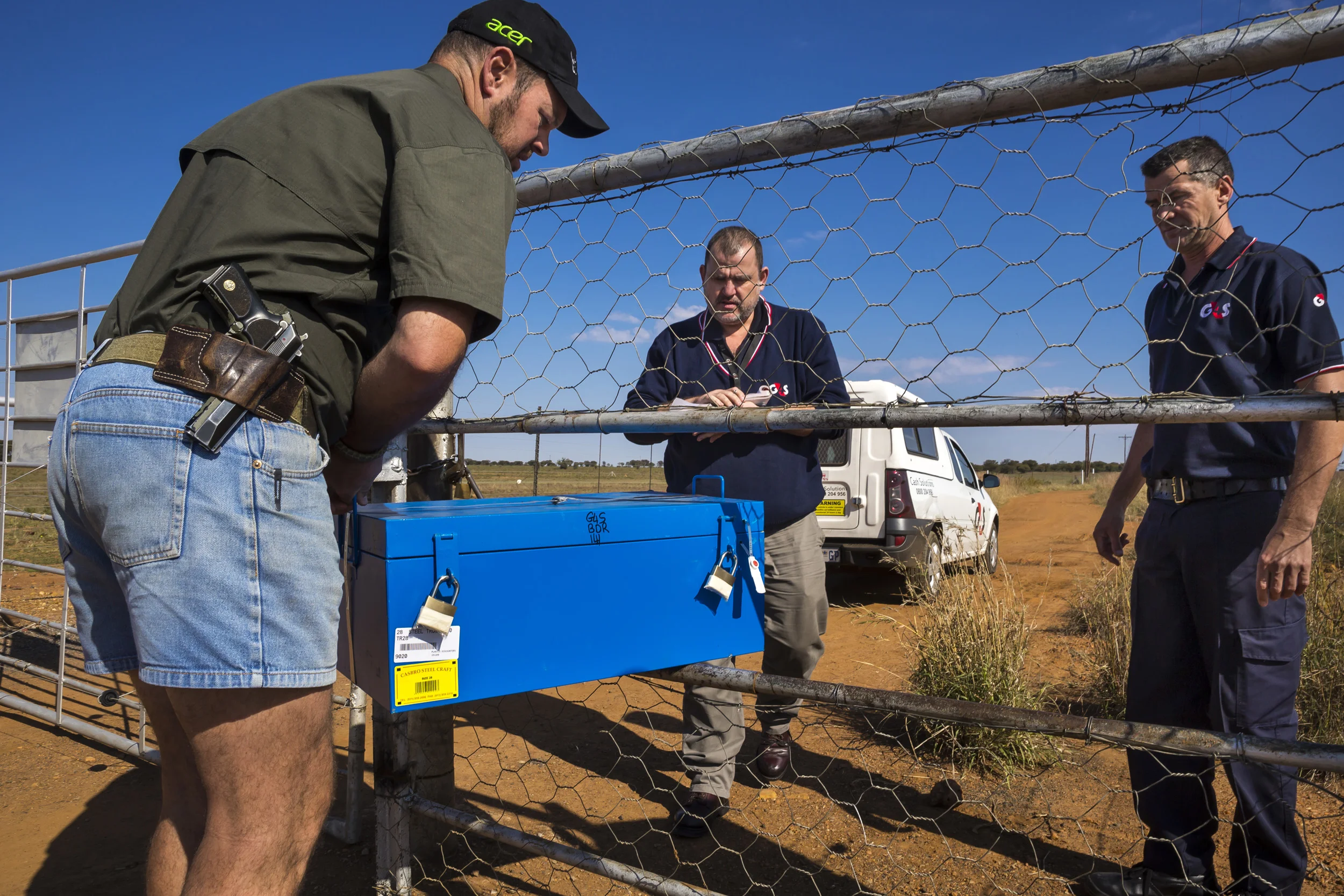 BUFFALO DREAM RANCH, KLERKSDORP, SOUTH AFRICA, 25 MAY 2016: A rhino horn security team prepares new horns that have come from that days legal dehornings. This is done in a secure location that changes every time horn is prepared for the sake of sec