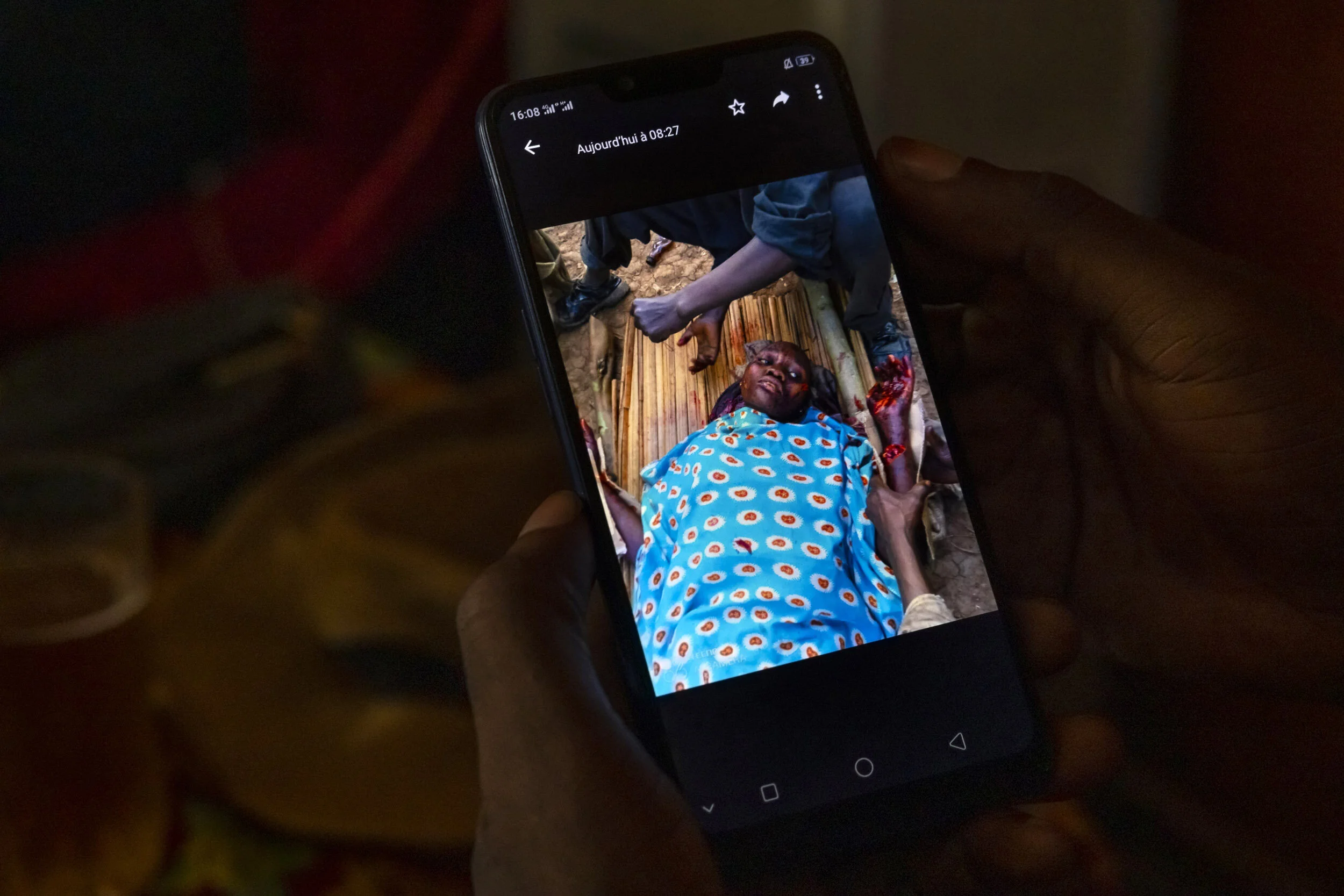 MWENDA TOWN, NORTH KIVU, DEMOCRATIC REPUBLIC OF CONGO, 7 APRIL 2021: One of the ways people in this region learn about ADF attacks is via social media, part of the reason the ADF has been so effective as a terror group. Most people have seen the ima