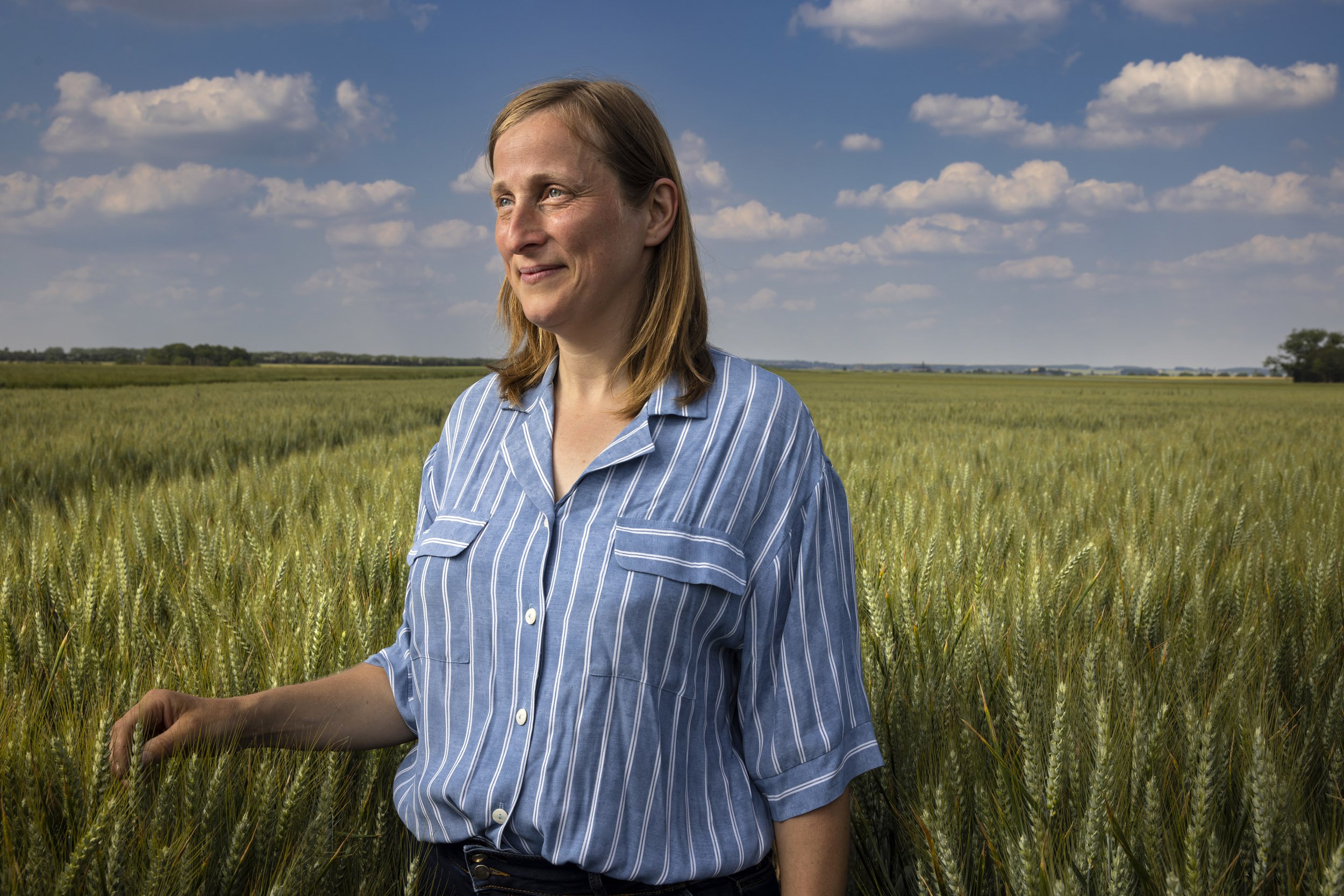 FONTENAY-LE-FLEURY, FRANCE, 8TH JUNE 2023: Farmer Dorothy is seen in her pristine wheat fields in the Fontenay-le-Fleury region of France with local Syngenta manager Damien Lenglet. Syngenta has a relationship with farmers in this region who utilize
