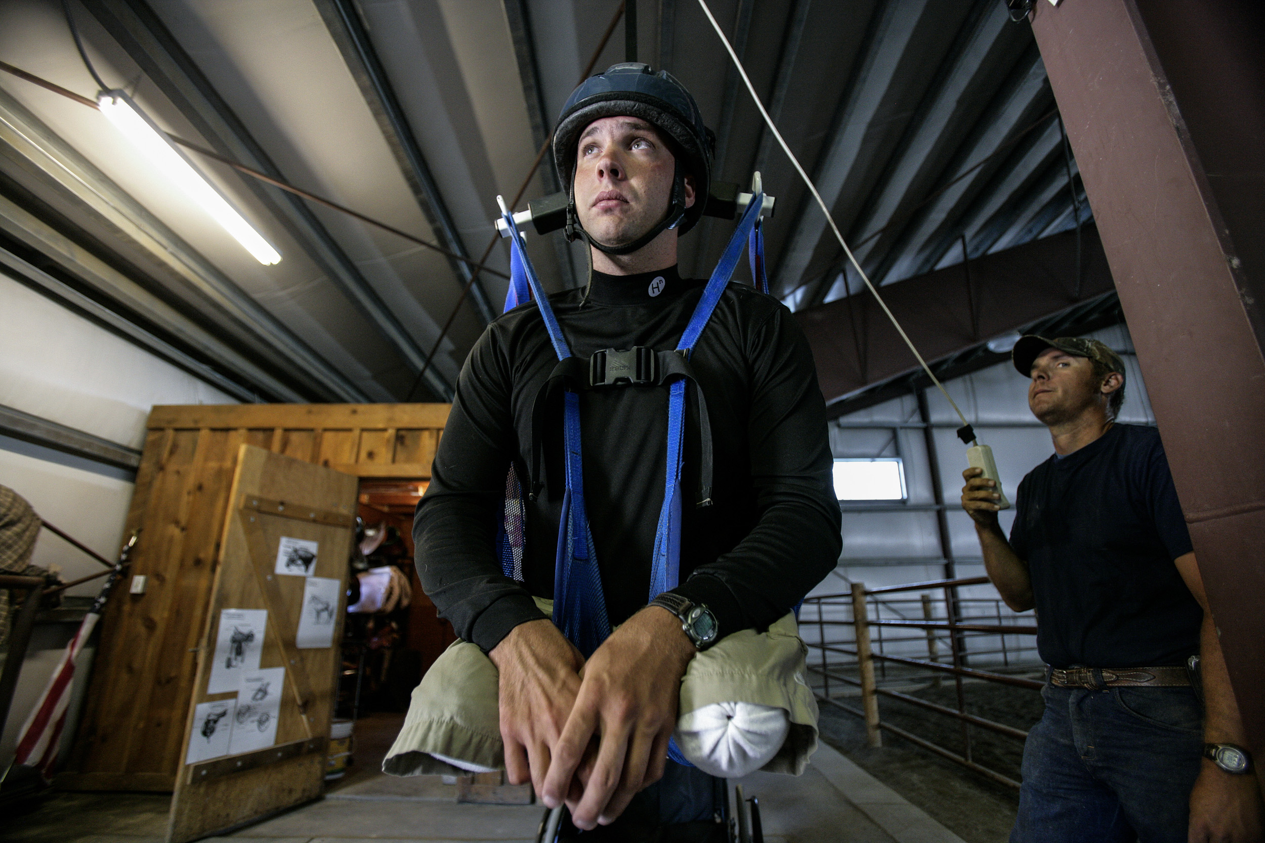 SUN VALLEY, IDAHO - 8/14 AUGUST 2006: Specialist Andy Soule, 25, learns to ride a horse as part of a series of choices he made as to which sports sorts he wanted to pursue as part of a week of outdoor activity. The programm is run by an organisation