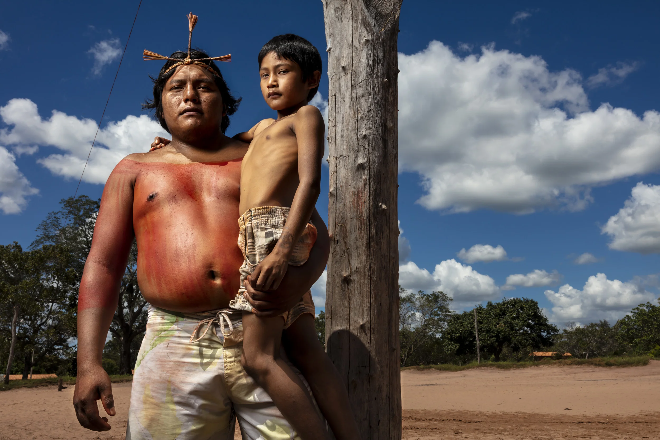 MARANHAO, BRAZIL, JUNE 2018: Chief Evandor Gaviao, 30, and his adopted son, the young chief of the village of Governador, the central village in the tribal area for Gaviao Indigenous people. TI Governador is the ancestral territory of the Gavião peo