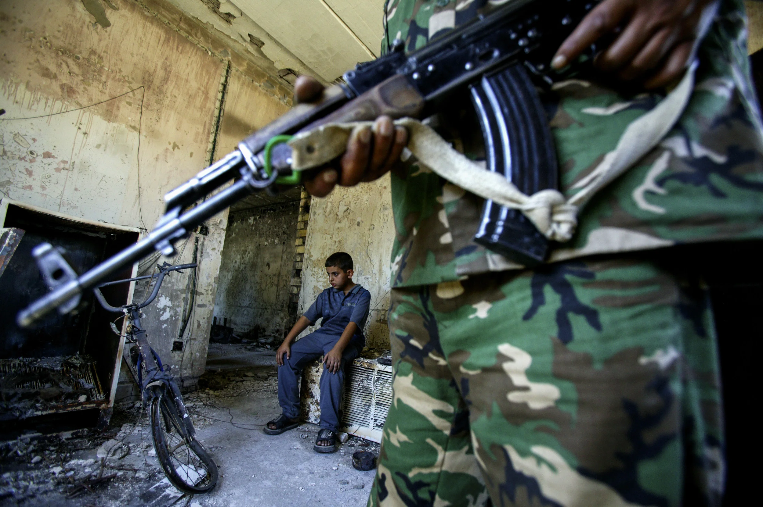 FALLUJAH,IRAQ - MAY 6: Members of the new Iraqi army do security checks on houses in Fallujah, although not yet involved in active fighting against the militia activity in the town, this new army will soon be part of ensuring security in Fallujah. T