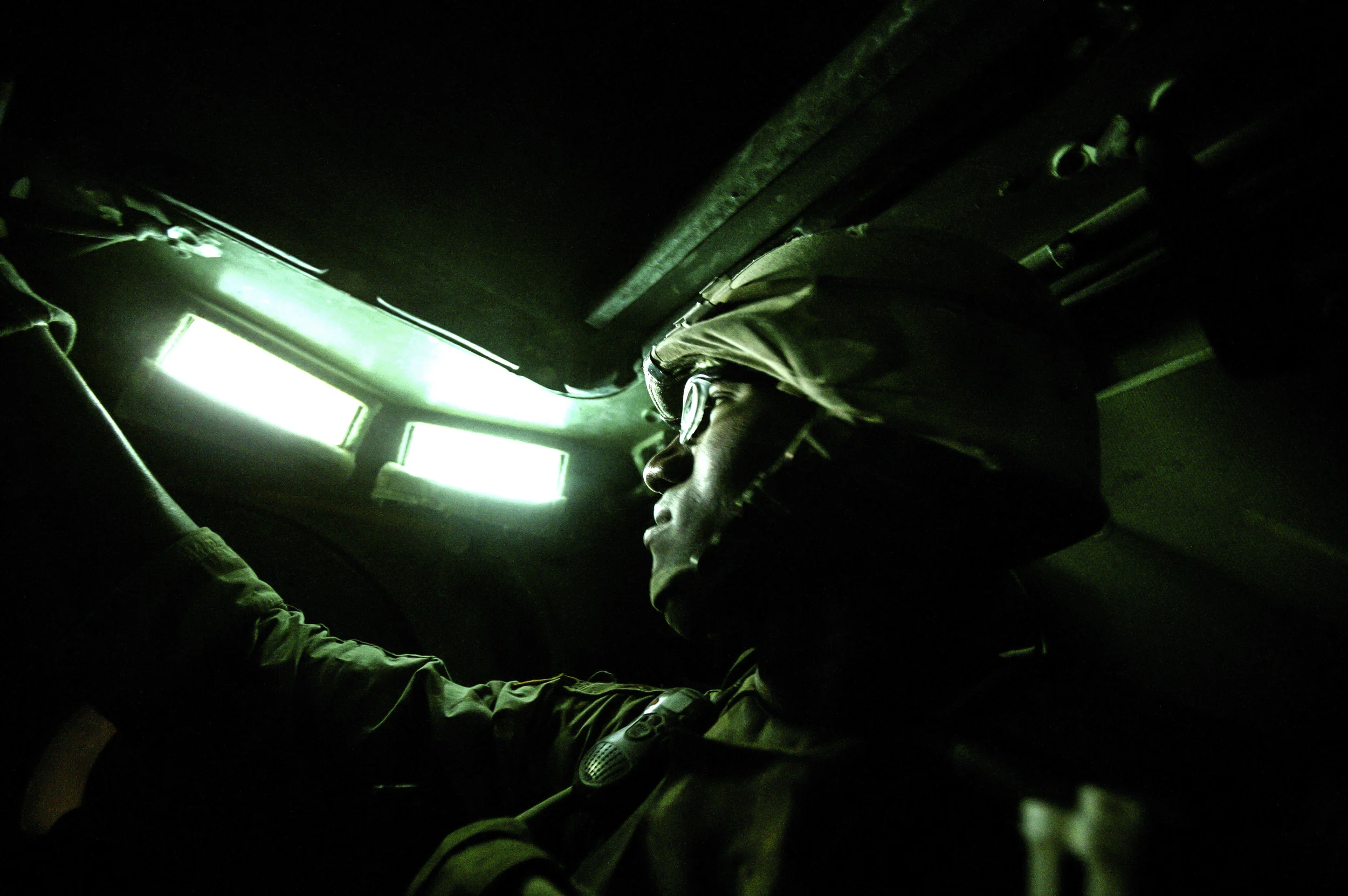 MAHMUYDIYAH,IRAQ - JUNE 7: Sgt John Jones of Bravo company, 1st Armoured Division, 6th Infantry stares out the window of a Bradley armoured personel carrier as the company patrols in Mahmuydiyah. Bravo company has taken a number of hits in recent da
