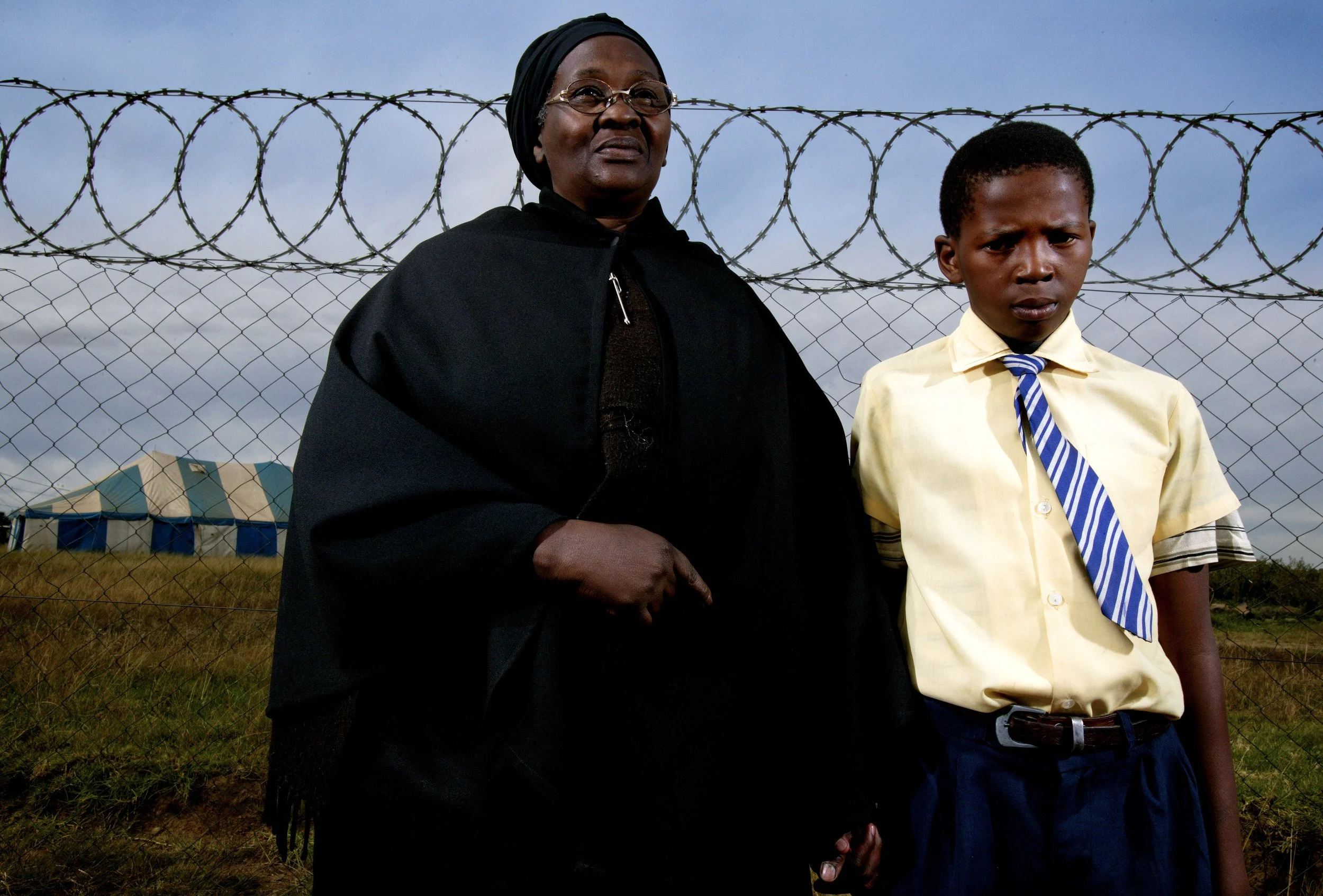 Grandmothers looking after their grandchildren after the HIV + parents have died.