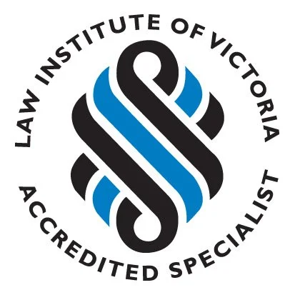 Logo of the Law Institute of Victoria with the text 'Law Institute of Victoria, Accredited Specialist' surrounding a stylized black and blue emblem.