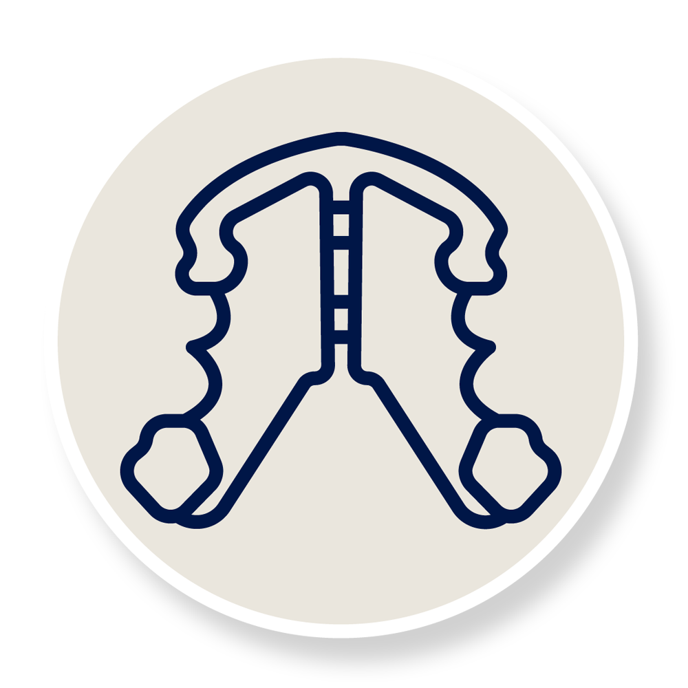 Four colorful retainers blue, green, red, and purple, each with clear plastic shields, arranged on a white background.