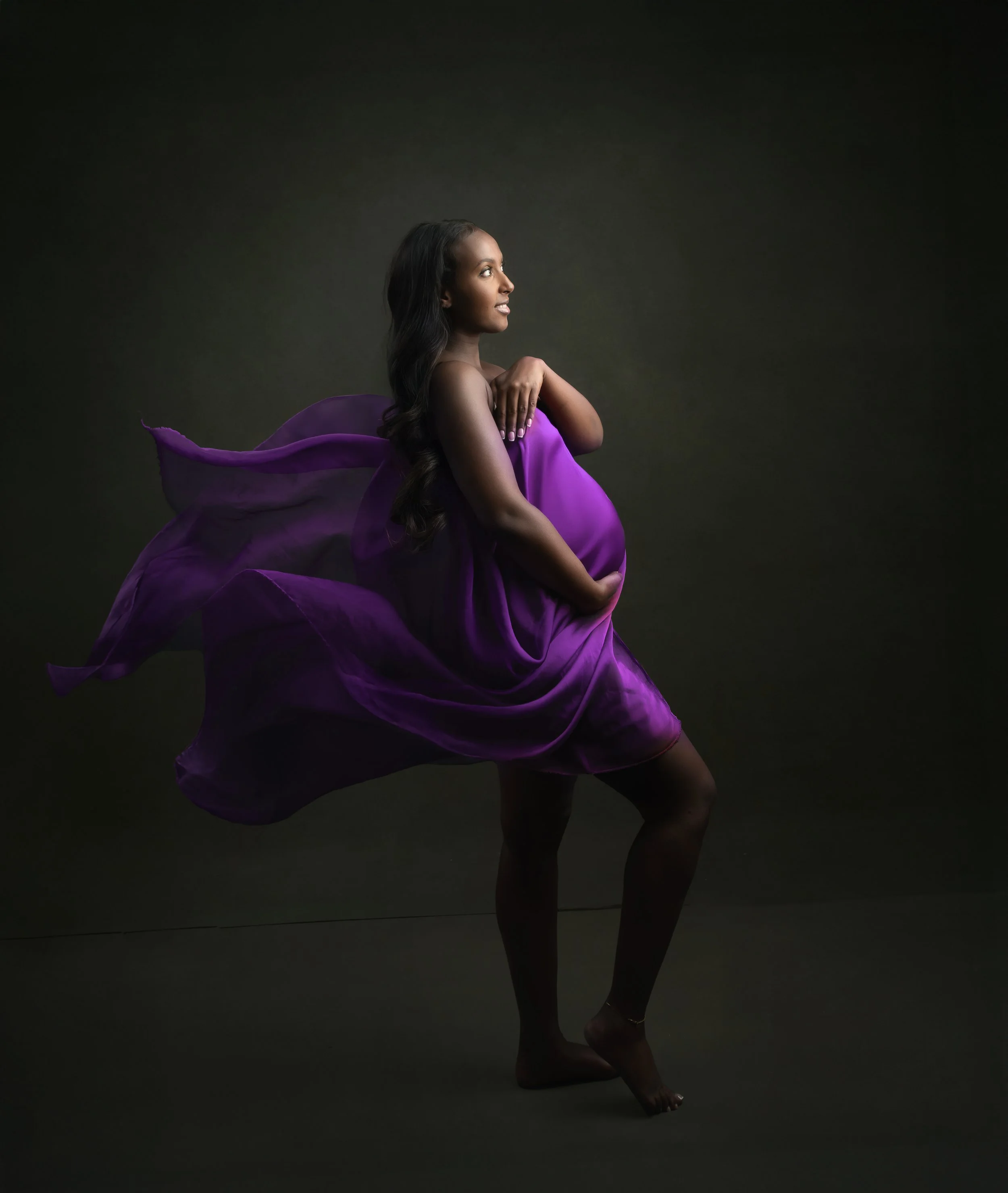 Vibrant purple gown pregnancy session in Hollywood Florida