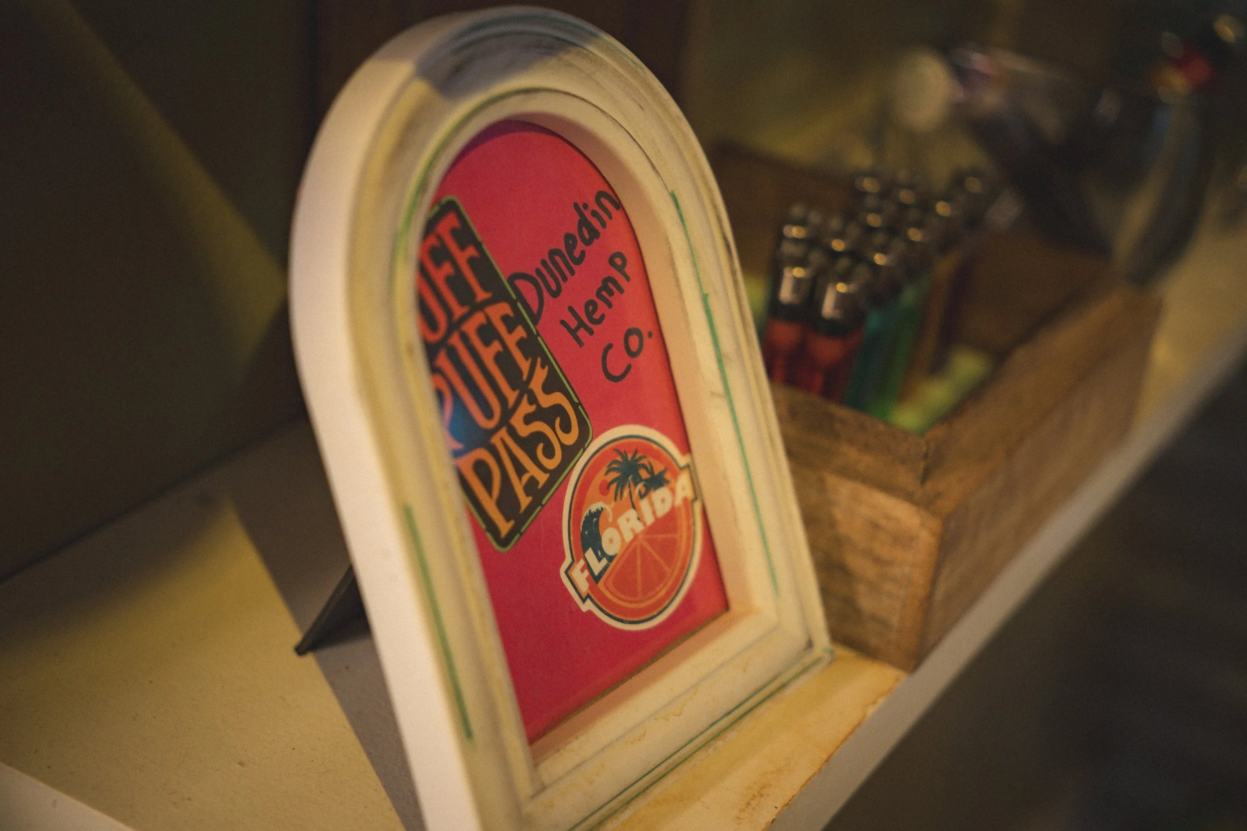 dunedin hemp company, hemp cafe, framed sign on counter
