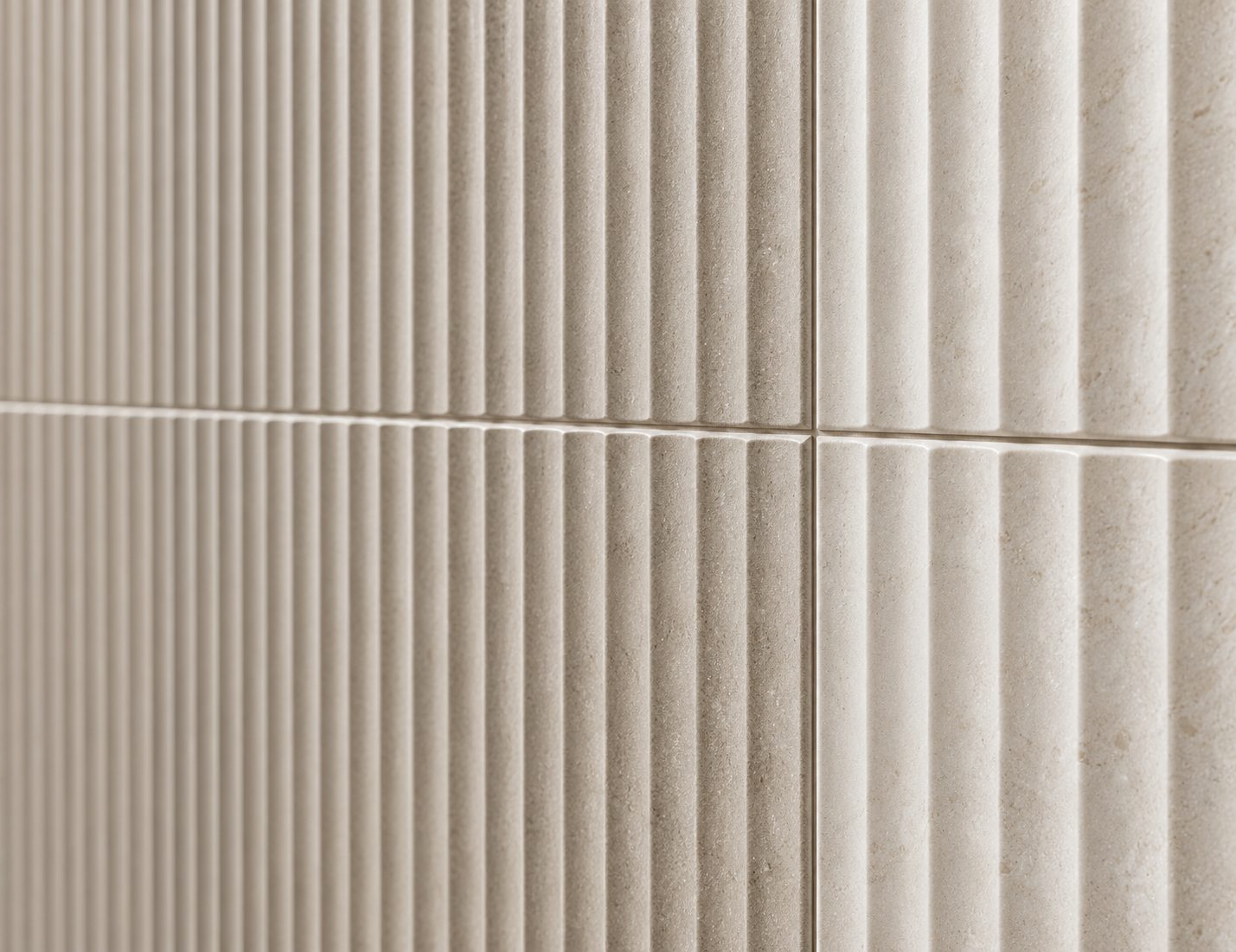 Warm greige fluted porcelain wall tiles with aligned textured detailing