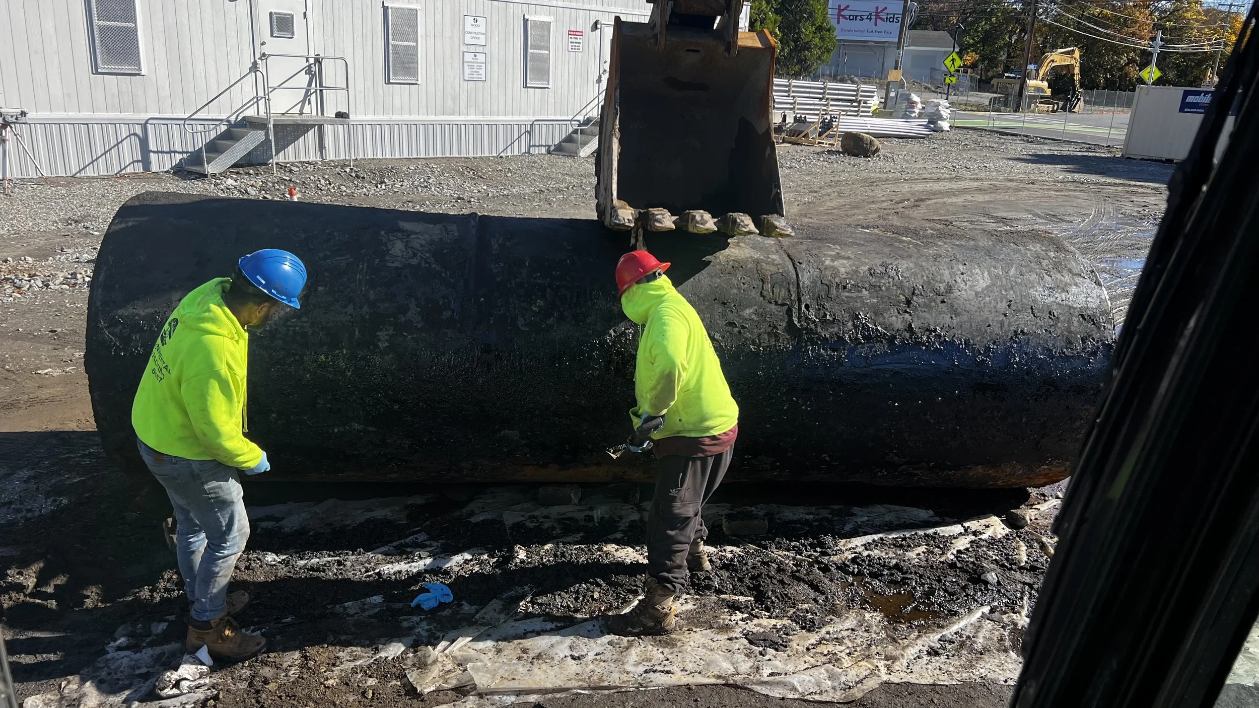 cleaning off the outside of an underground storage tank
