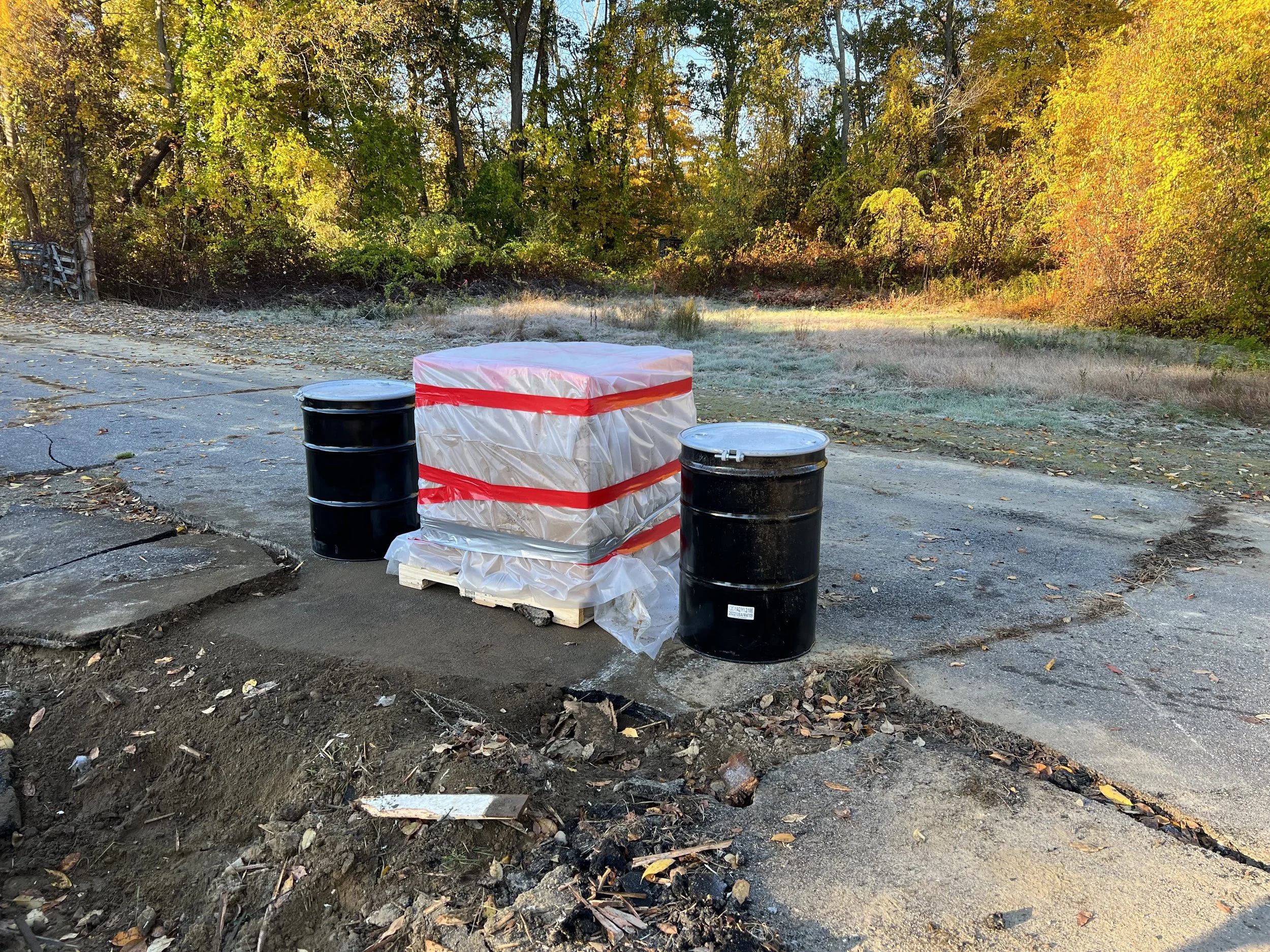 packaging hazardous soil contaminated with lead into 55 gallon drums