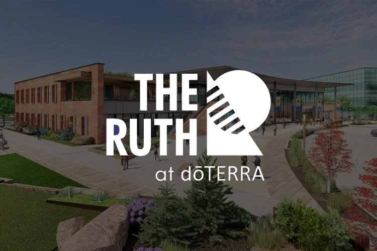 Logo for The Ruth at doTERRA with a stylized microphone, superimposed over an outdoor plaza with modern buildings and landscaped greenery.