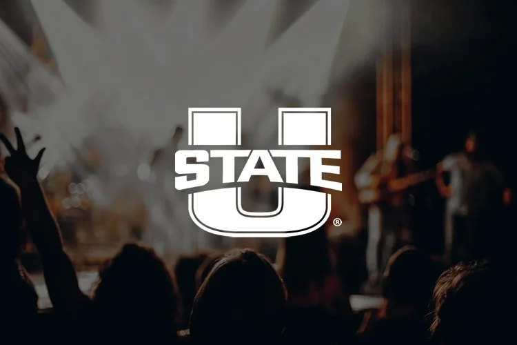 University of Utah logo over a concert scene with audience, performers, and stage lighting.
