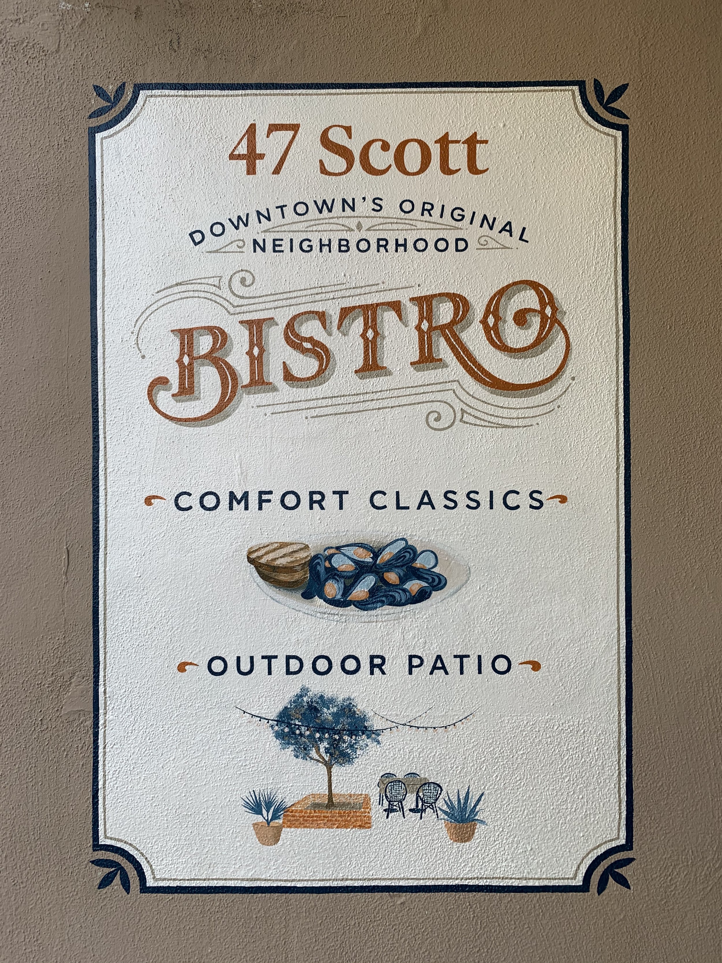 Sign for 47 Scott Bistro with text about downtown neighborhood, comfort classics, outdoor patio, and illustrations of a bowl of beans, a tree, and patio chairs.