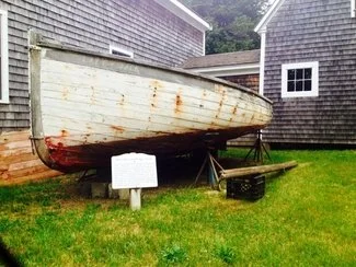 Catboat Lazy Jack
Another one of Crosby catboats is the “Lazy Jack,” built in 1923 by H. Manley Crosby. It is a classic example of a large square-stern cat boat with a “barn door” rudder and a cabin. This venerable boat was donated by Chester (Booki