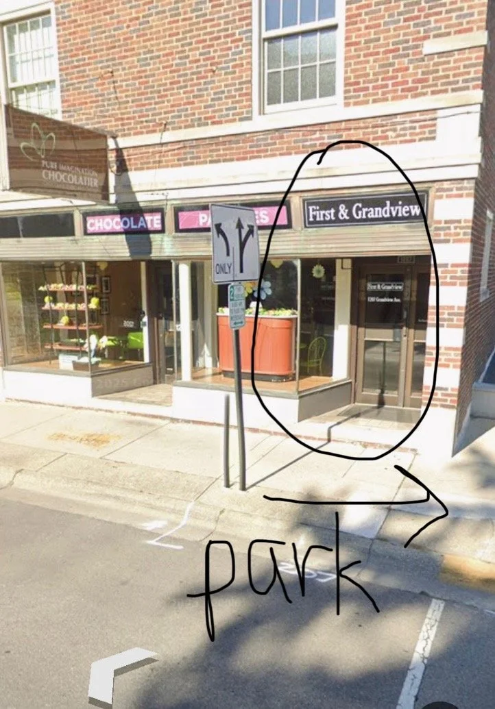 The street view. Located immediately right of the chocolatier store. Enter the front door and go straight upstairs. Free parking to the right and on the street!