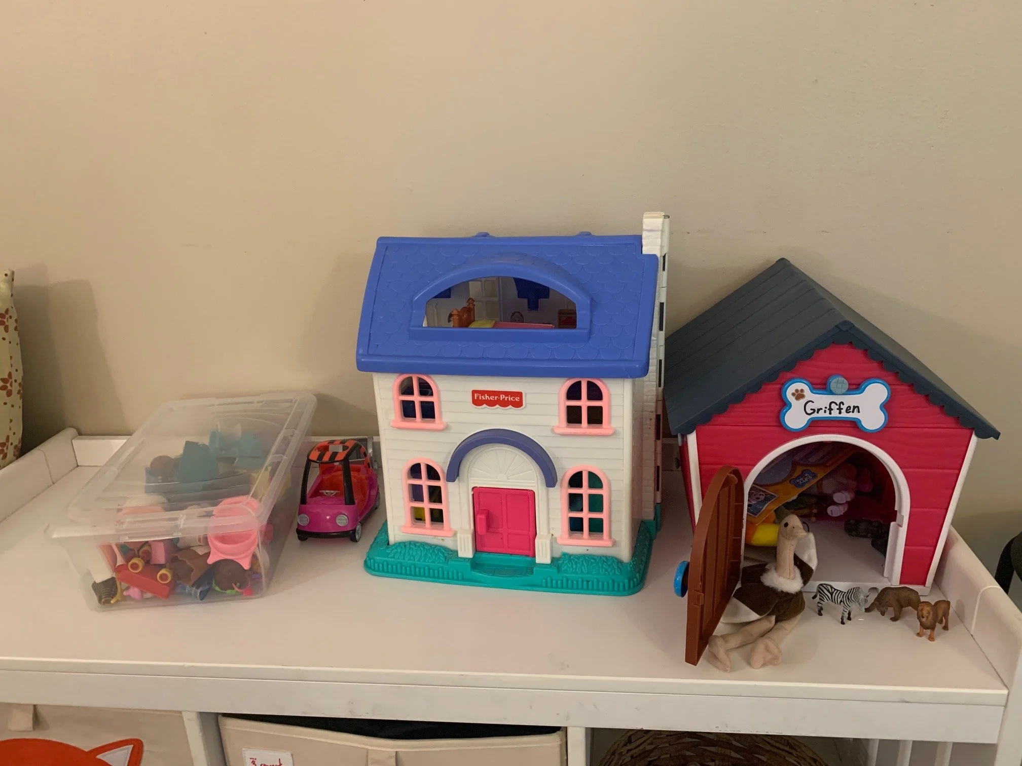 Dollhouse and animal barn.
