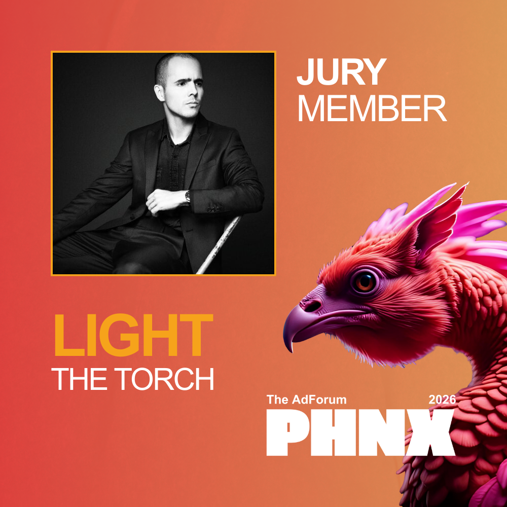 A promotional graphic for the PHNX 2026 event. It features a black and white photo of a man in a suit, labeled as a jury member, and an illustration of a colorful, fantastical bird with pink and purple feathers, with the event’s slogan "Light the Torch" and the text "The AdForum 2026 PHNX".