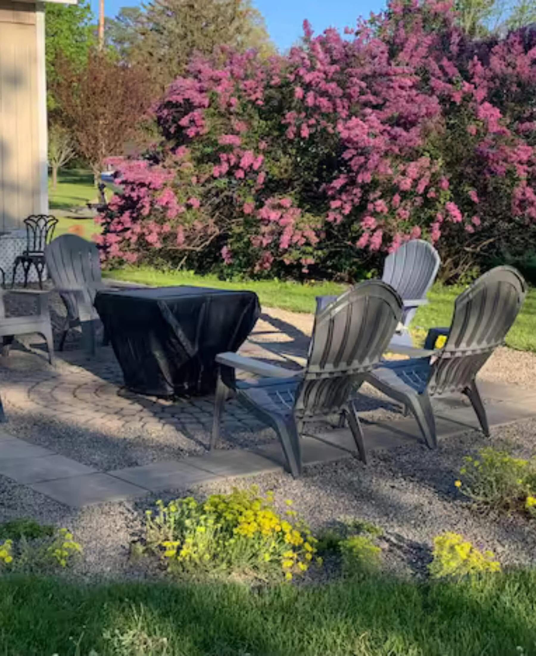 Private outdoor fire pit and seating area at a Finger Lakes retreat in Penn Yan, New York